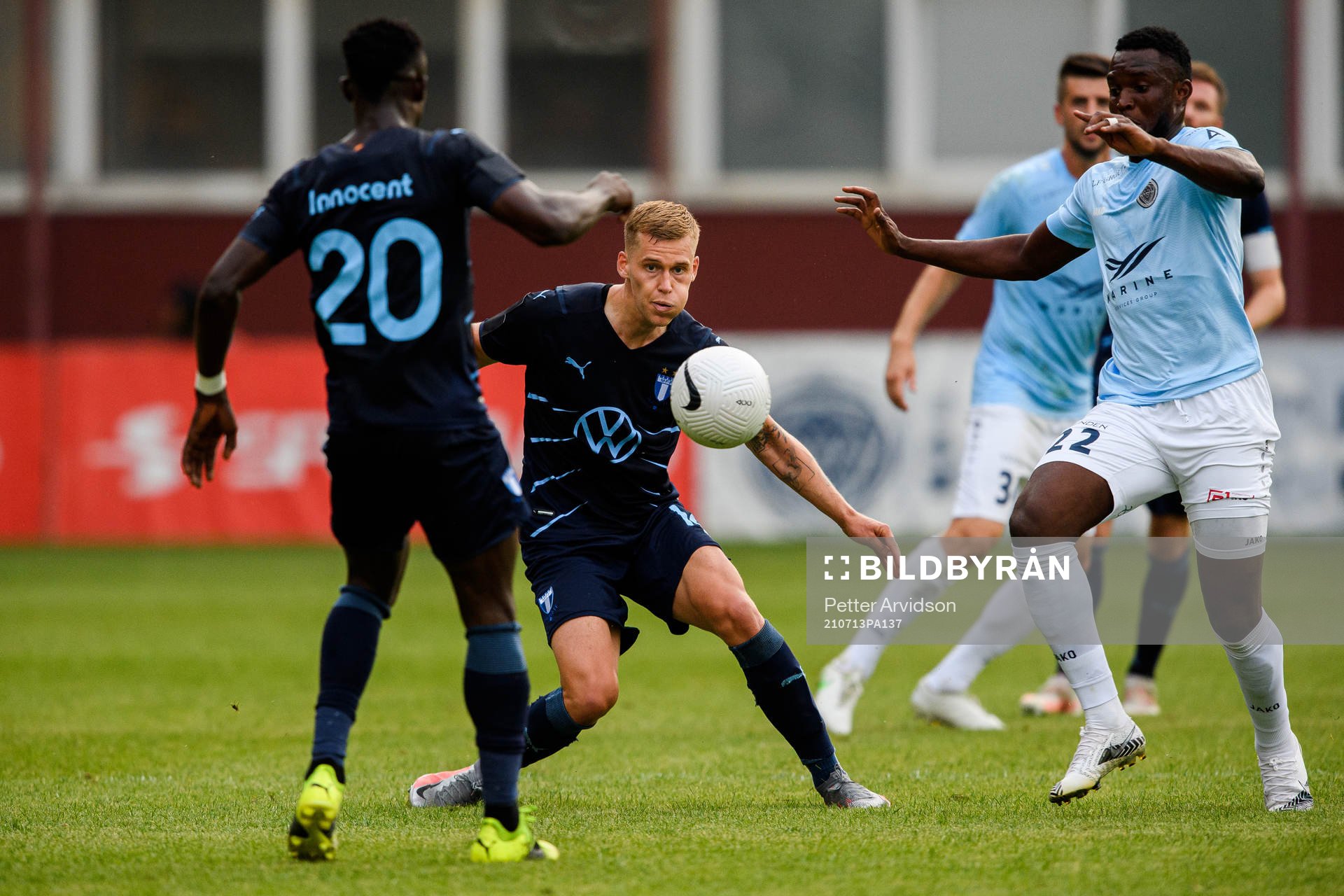 Felix Beijmo of Malmö FF and Mbomo Kule of Riga