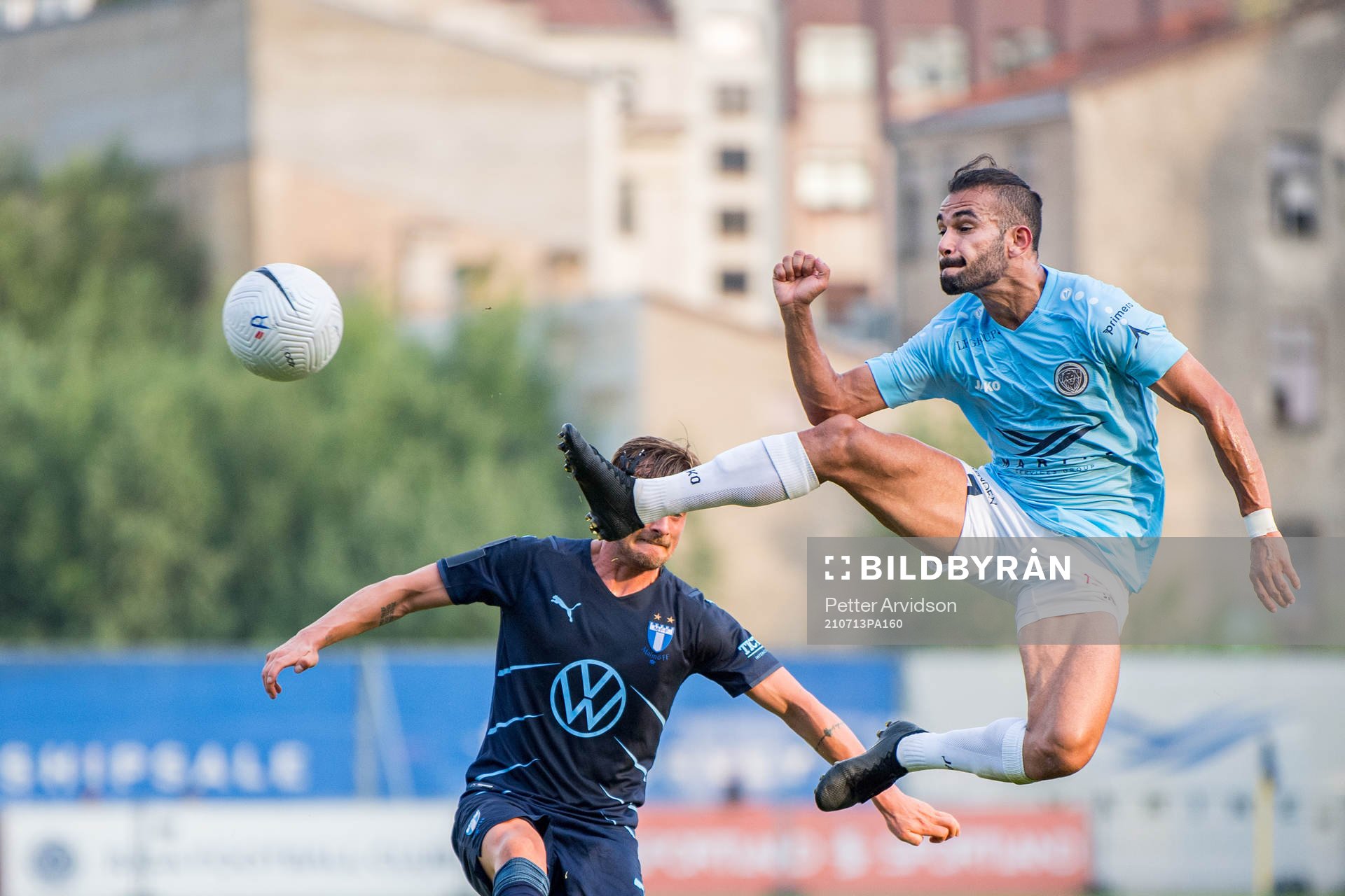 Felipe Brisola of Riga and Eric Larsson of Malmö FF
