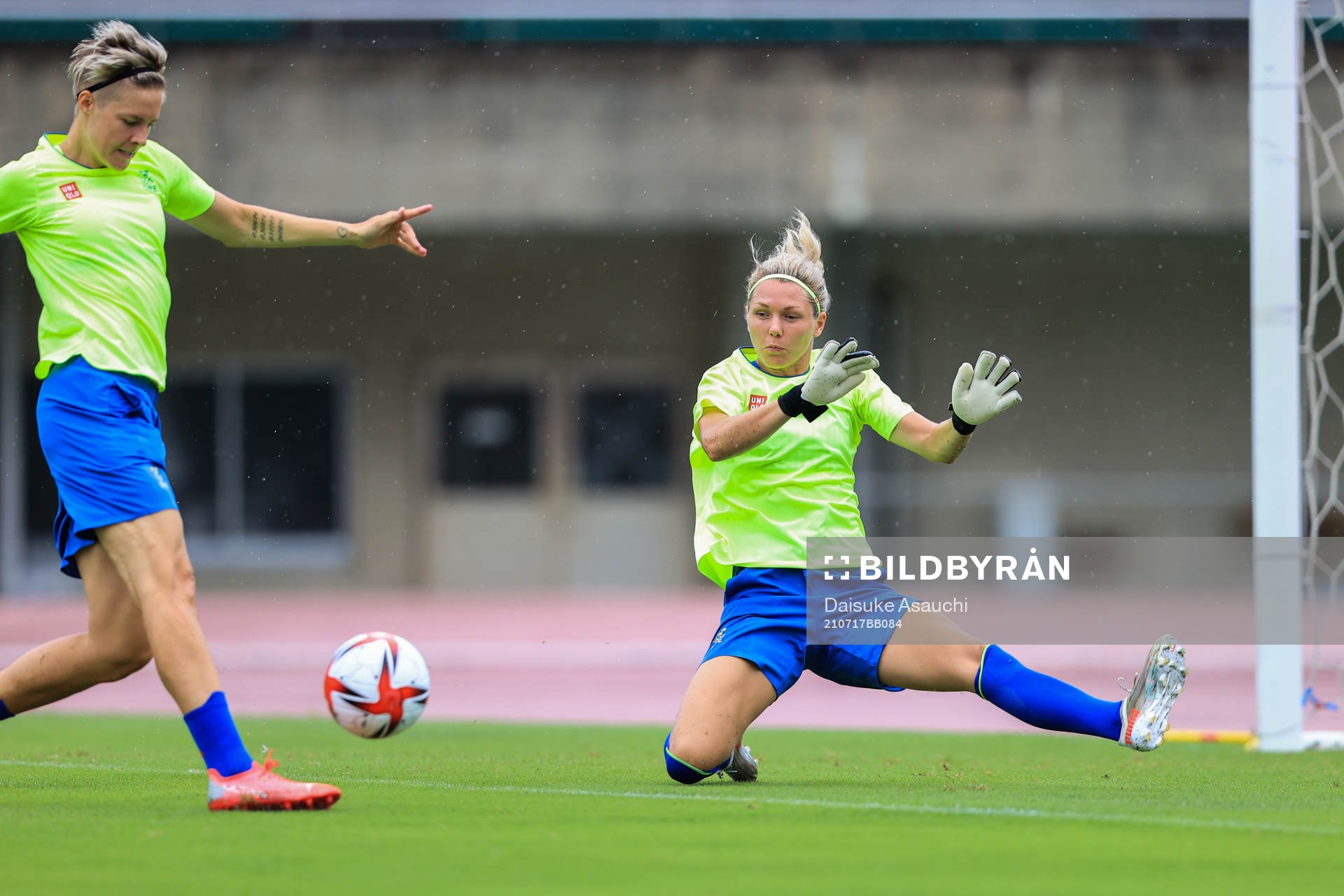 Lina Hurtig and goalkeeper Jennifer Falk of the Swedish