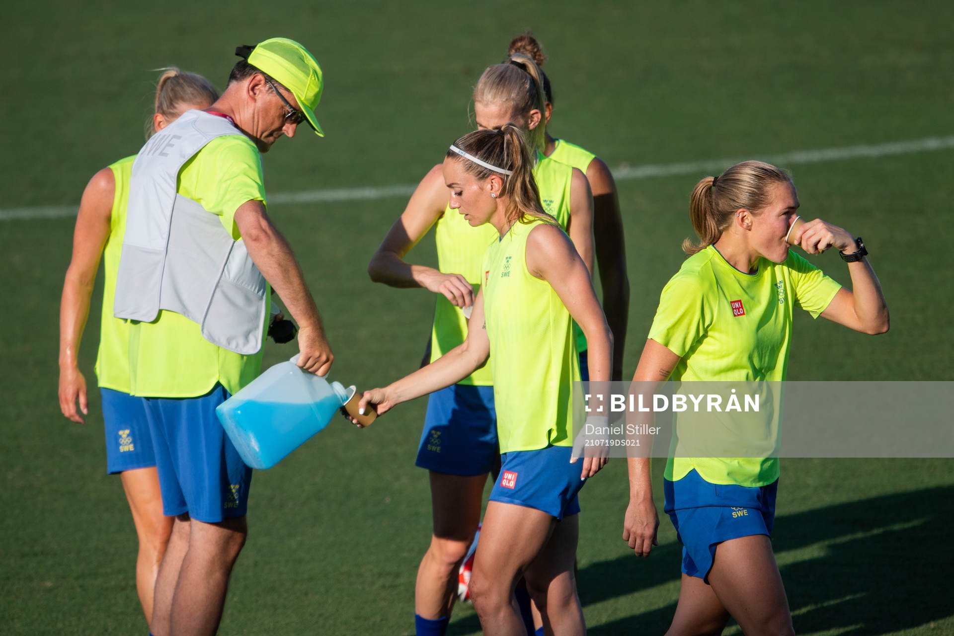 Kosovare Asllani and Magdalena Eriksson of the Swedish national women’s football team drinks water during a training session ahead of the Tokyo 2020 Olympic Games on July 19, 2021 in Tokyo.