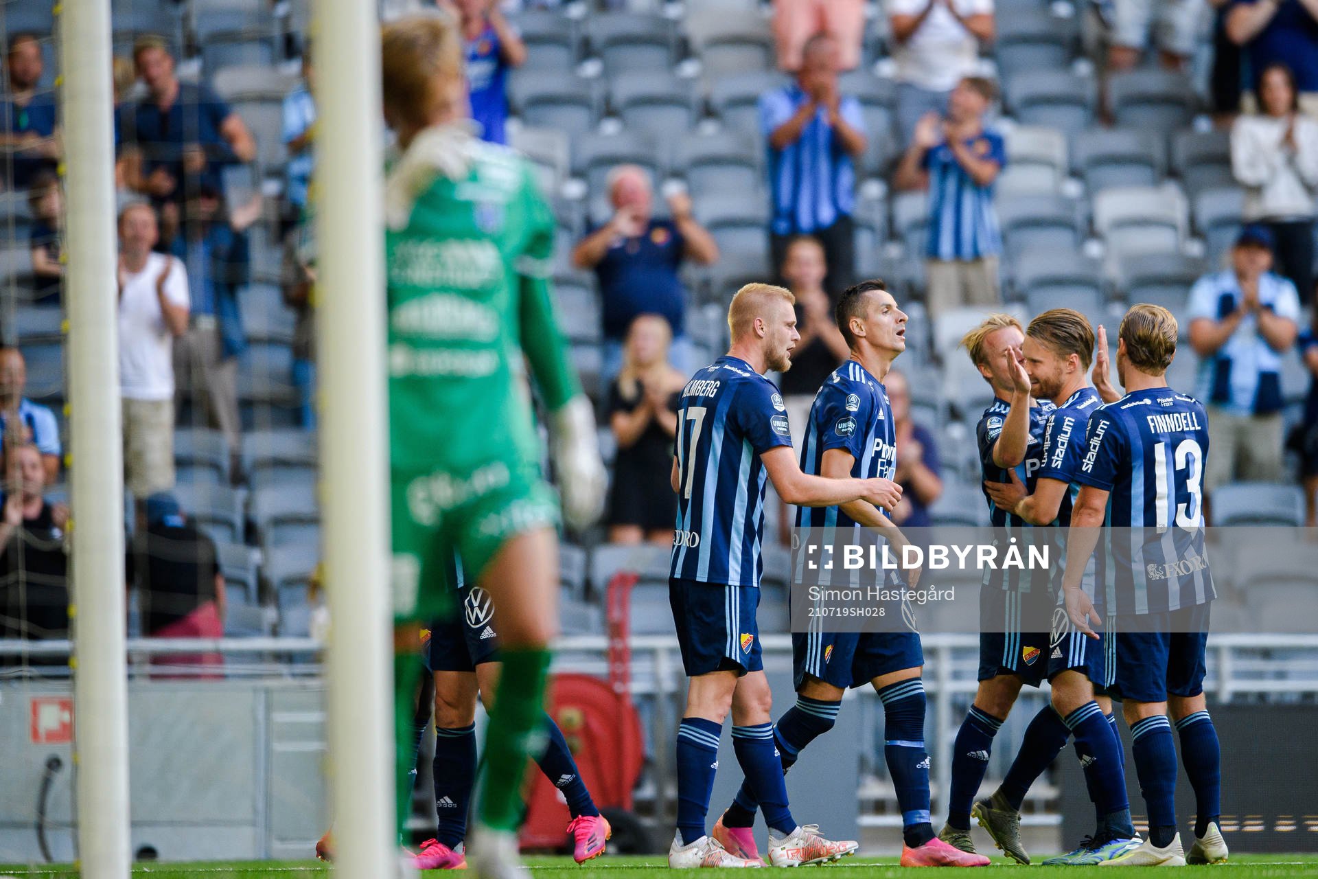 Djurgårdens Kalle Holmberg , Haris Radetinac , Elliot Käck , Jacob Une Larsson och Hampus Finndell jublar efter 4-0 av Edward Chilufya , ej i bild, under fotbollsmatchen i Allsvenskan mellan Djurgården och Sirius den 19 juli 2021 i Stockholm.