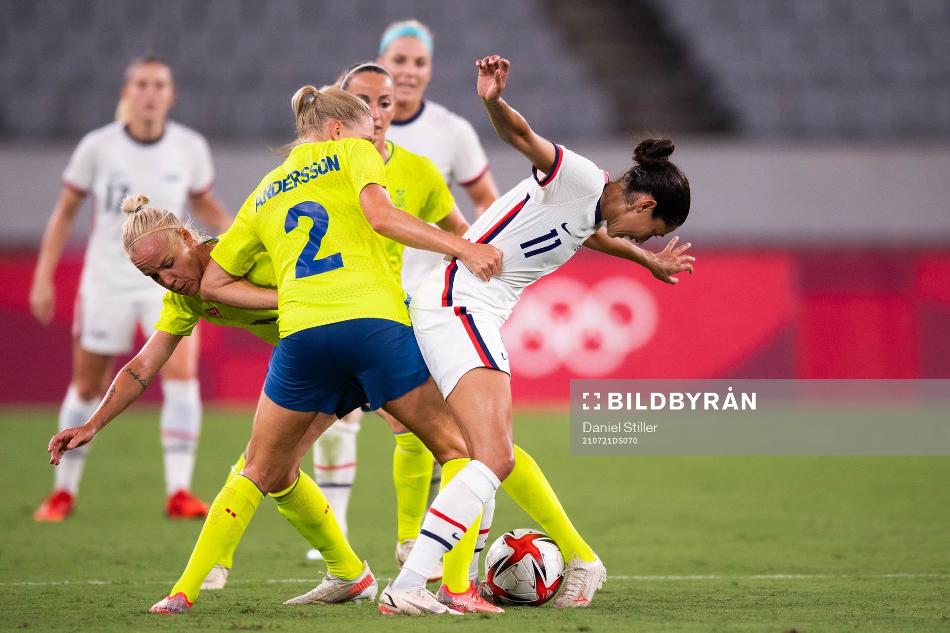 Christen Press of USA tries to get pass Caroline Seger and