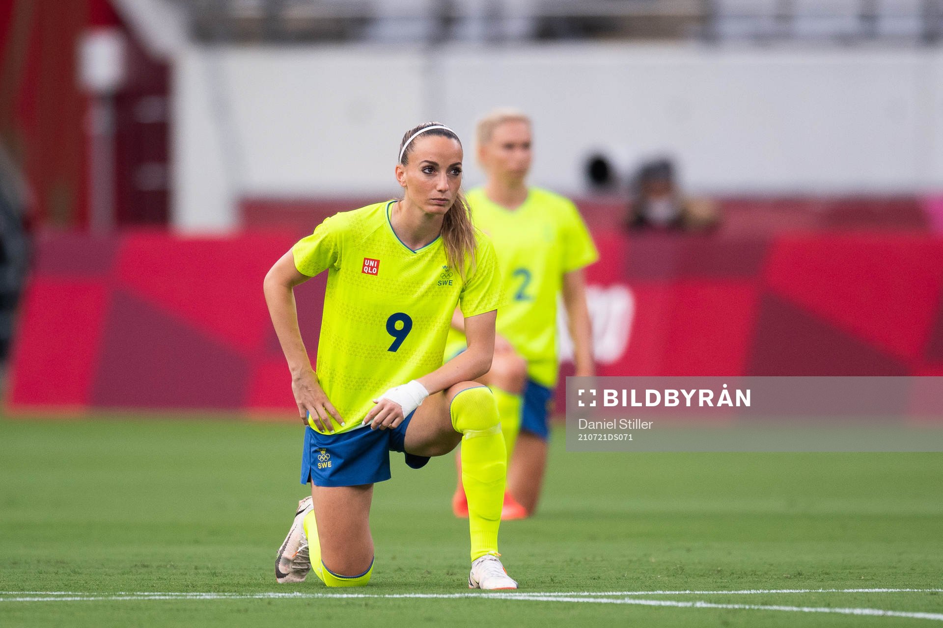 Kosovare Asllani of Sweden kneels