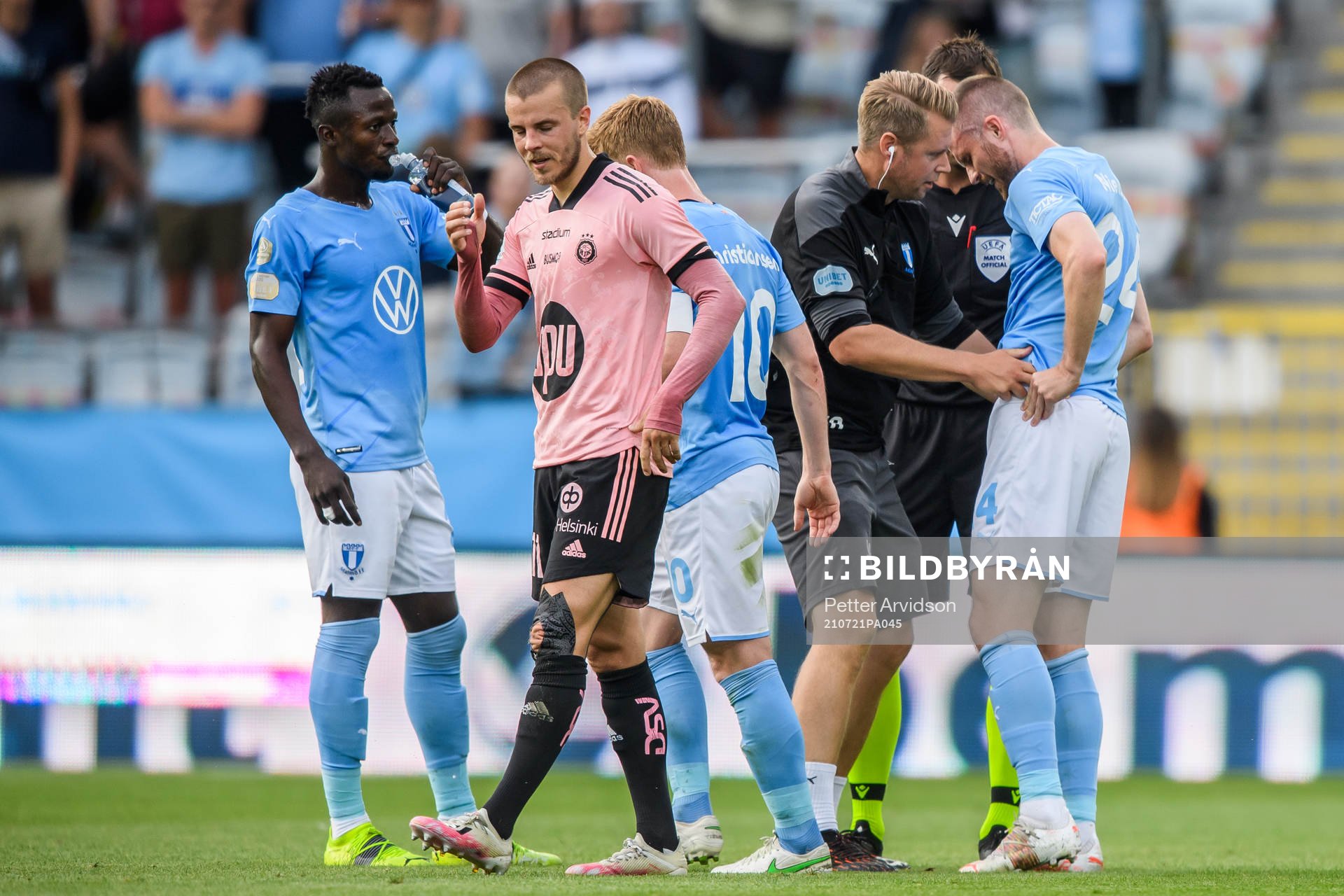 Lasse Nielsen of Malmö FF recieve medical attention