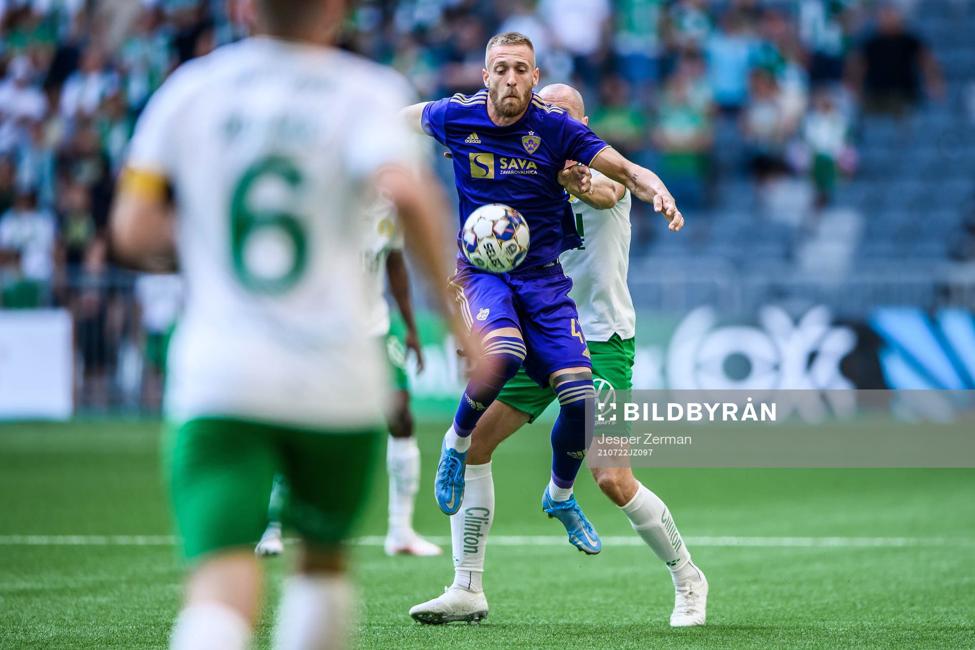 Andrej Kotnik of Maribor and Jon Gudni Fjoluson of Hammarby during the UEFA Conference League qualifying match between Hammarby and Maribor on July 22, 2021 in Stockholm. 