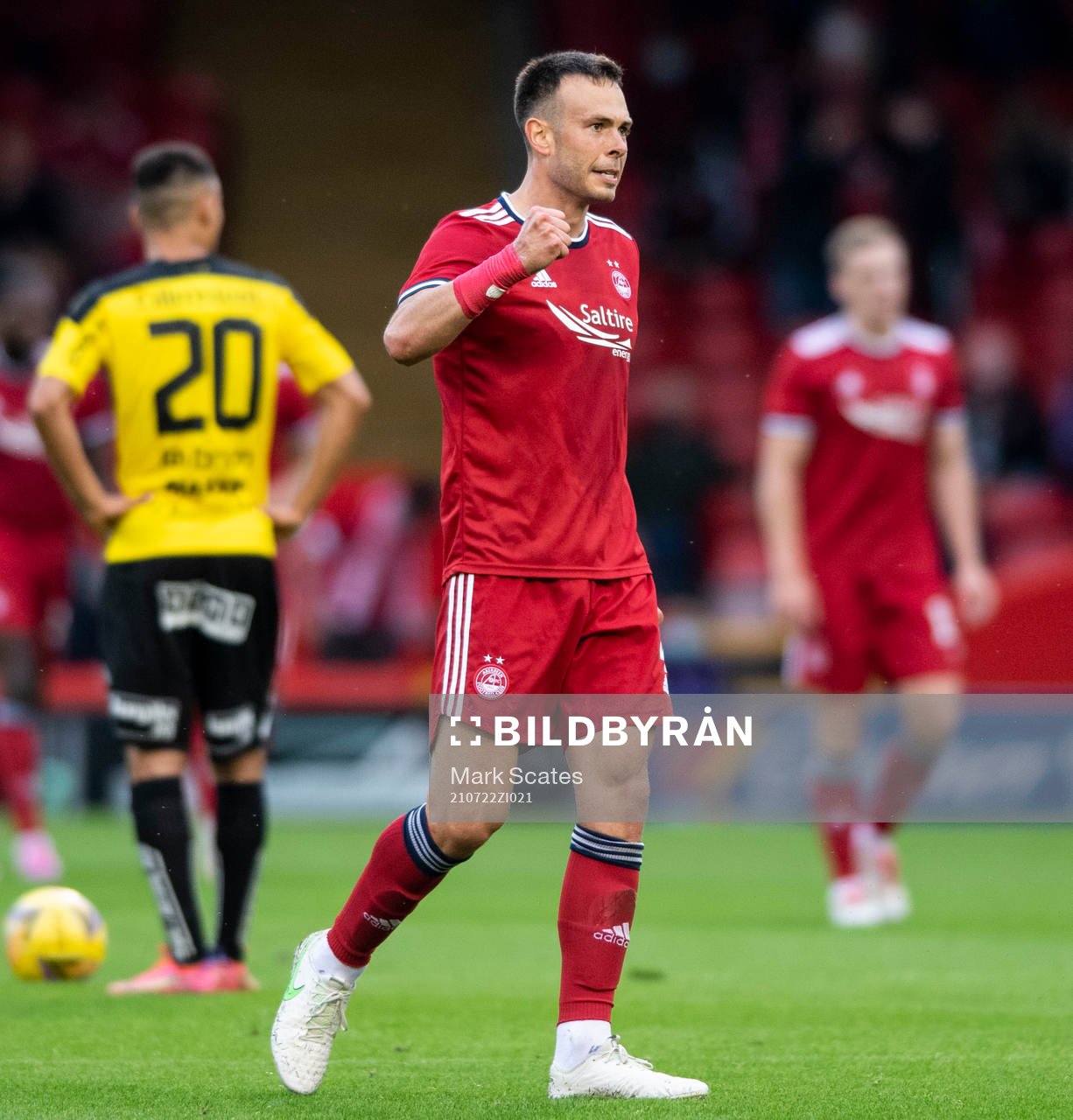 Andrew Considine of Aberdeen celebrates