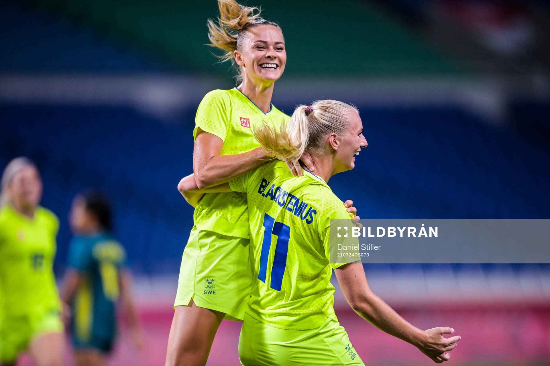 Fridolina Rolfö and Stina Blackstenius of Sweden celebrate