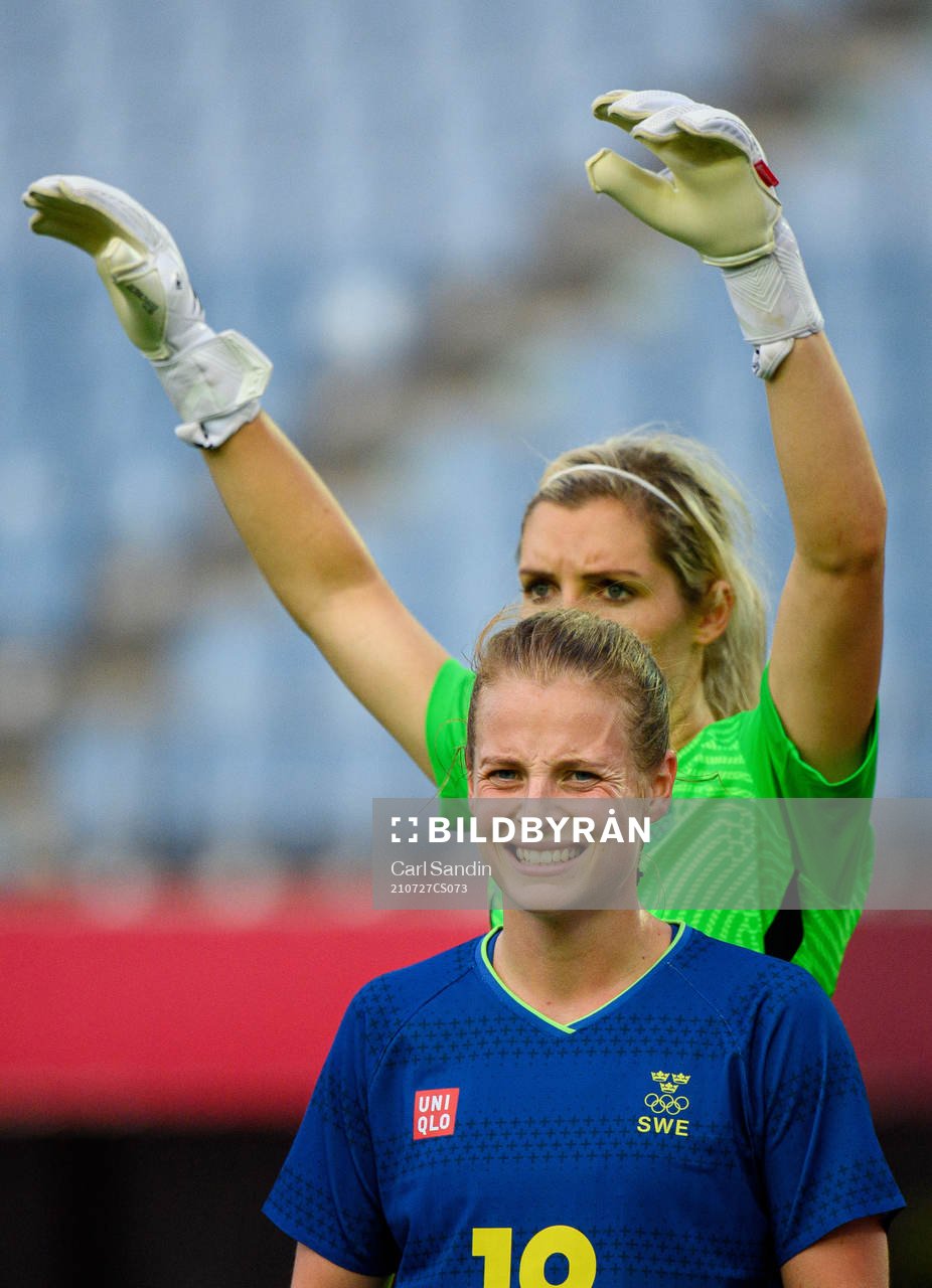 Anna Anvegård and goalkeeper Erin Nayler of New Zealand in