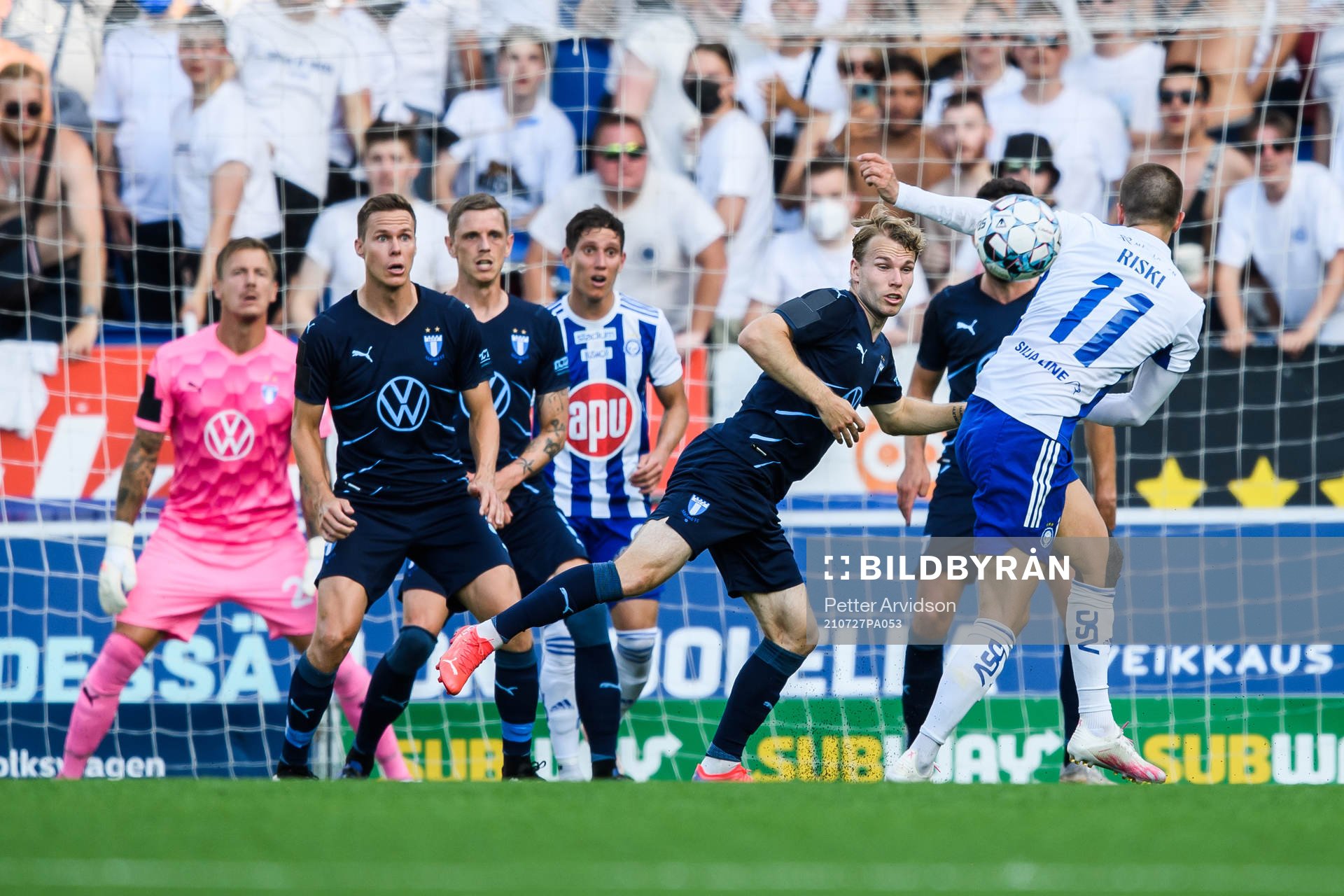 Oscar Lewicki of Malmö FF and Roope Riski of Helsinki during the UEFA Champions League qualifying match between HJK Helsinki and Malmö FF on July 27, 2021 in Helsinki.