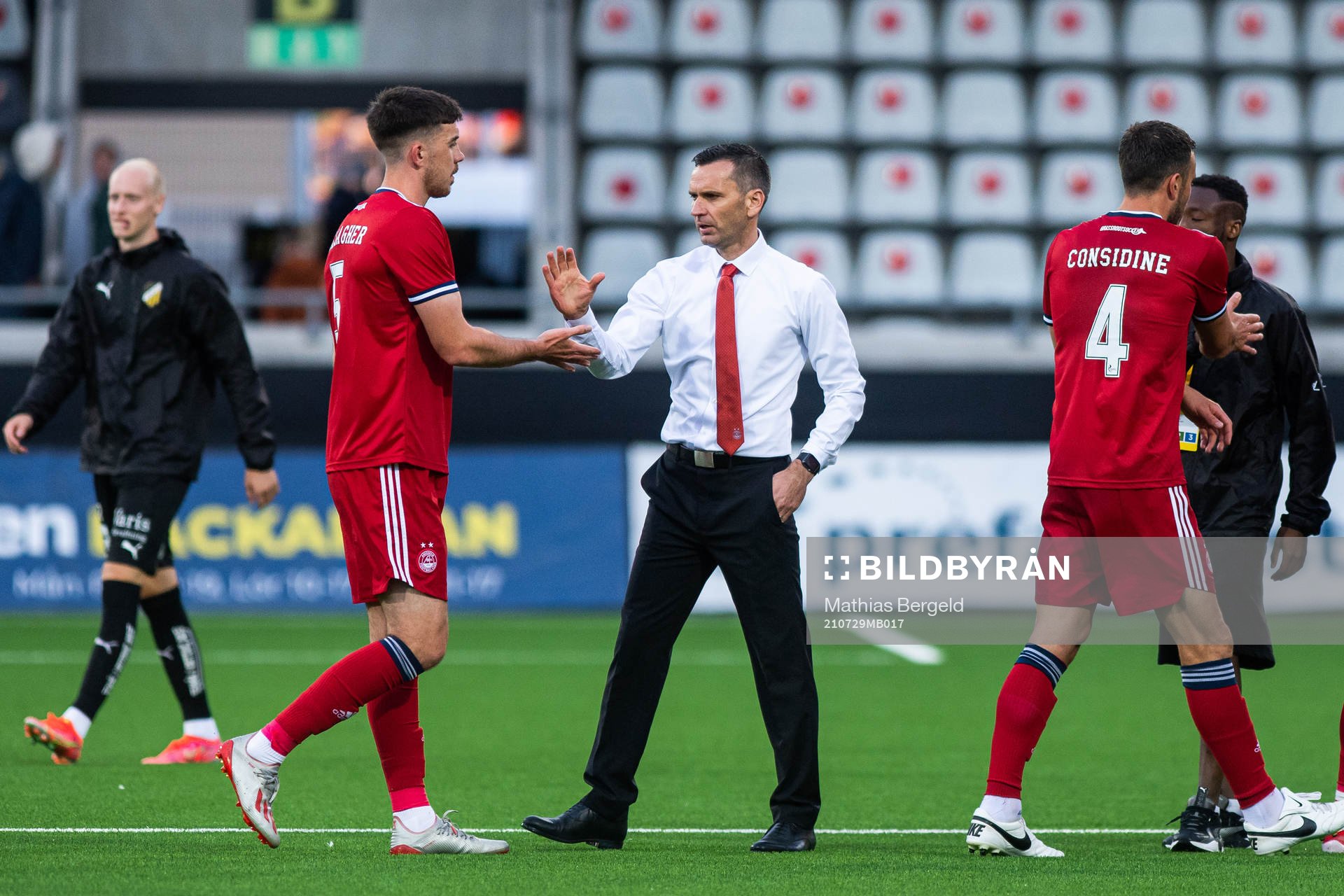 Declan Gallagher and Stephen Glass, head coach of Aberdeen,