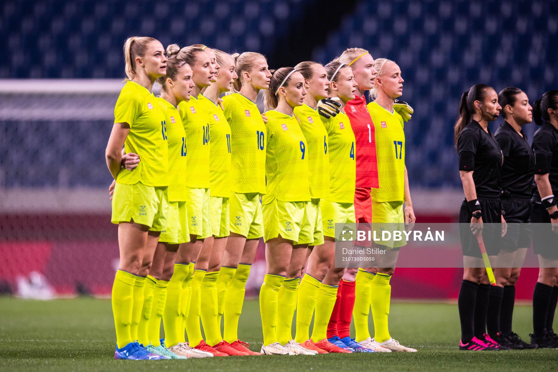Players of Sweden during the national anthem in the women's football match between Sweden and Japan at the Tokyo 2020 Olympic Games on July 30, 2021 in Tokyo.