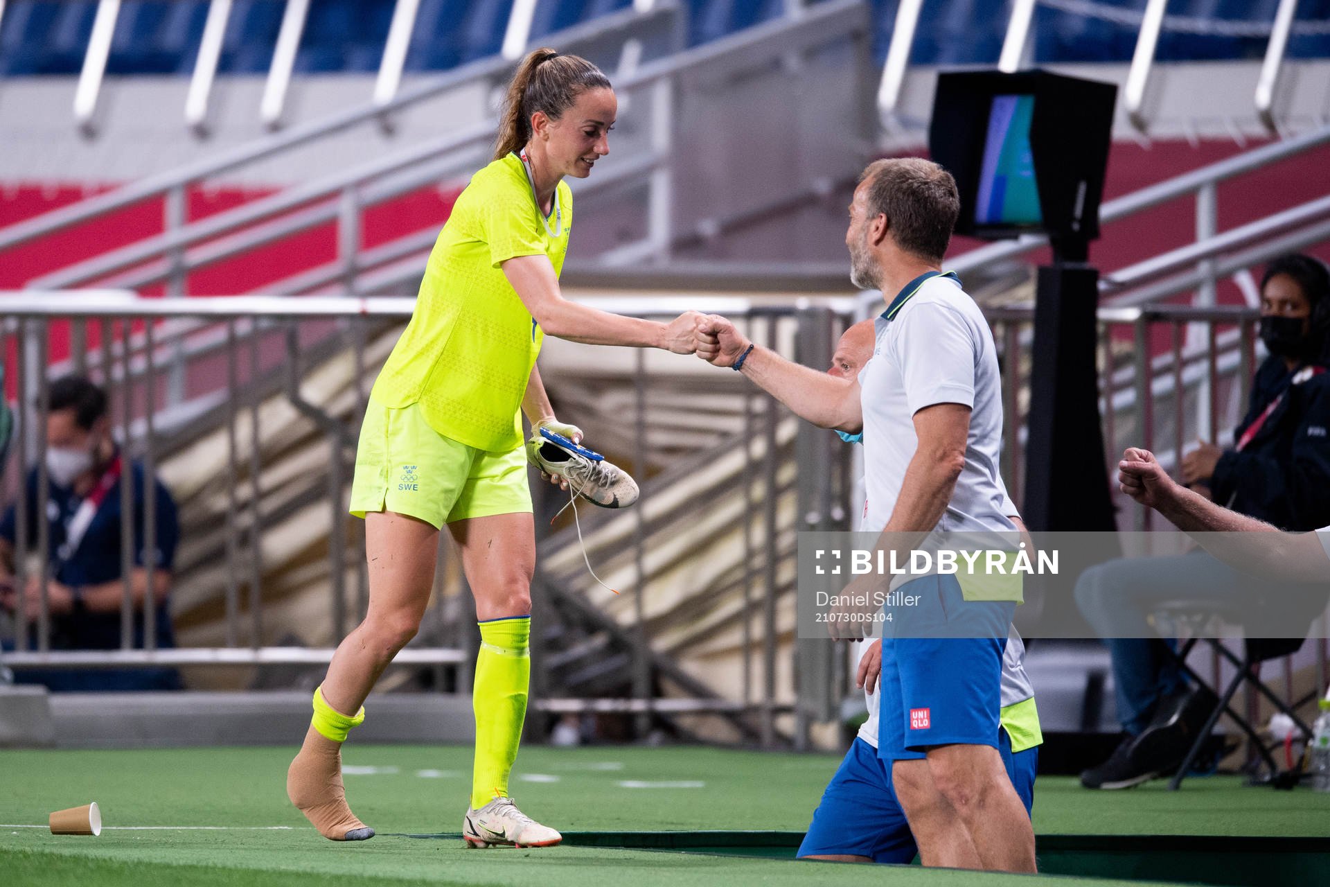 Kosovare Asllani of Sweden is injured in the women's
