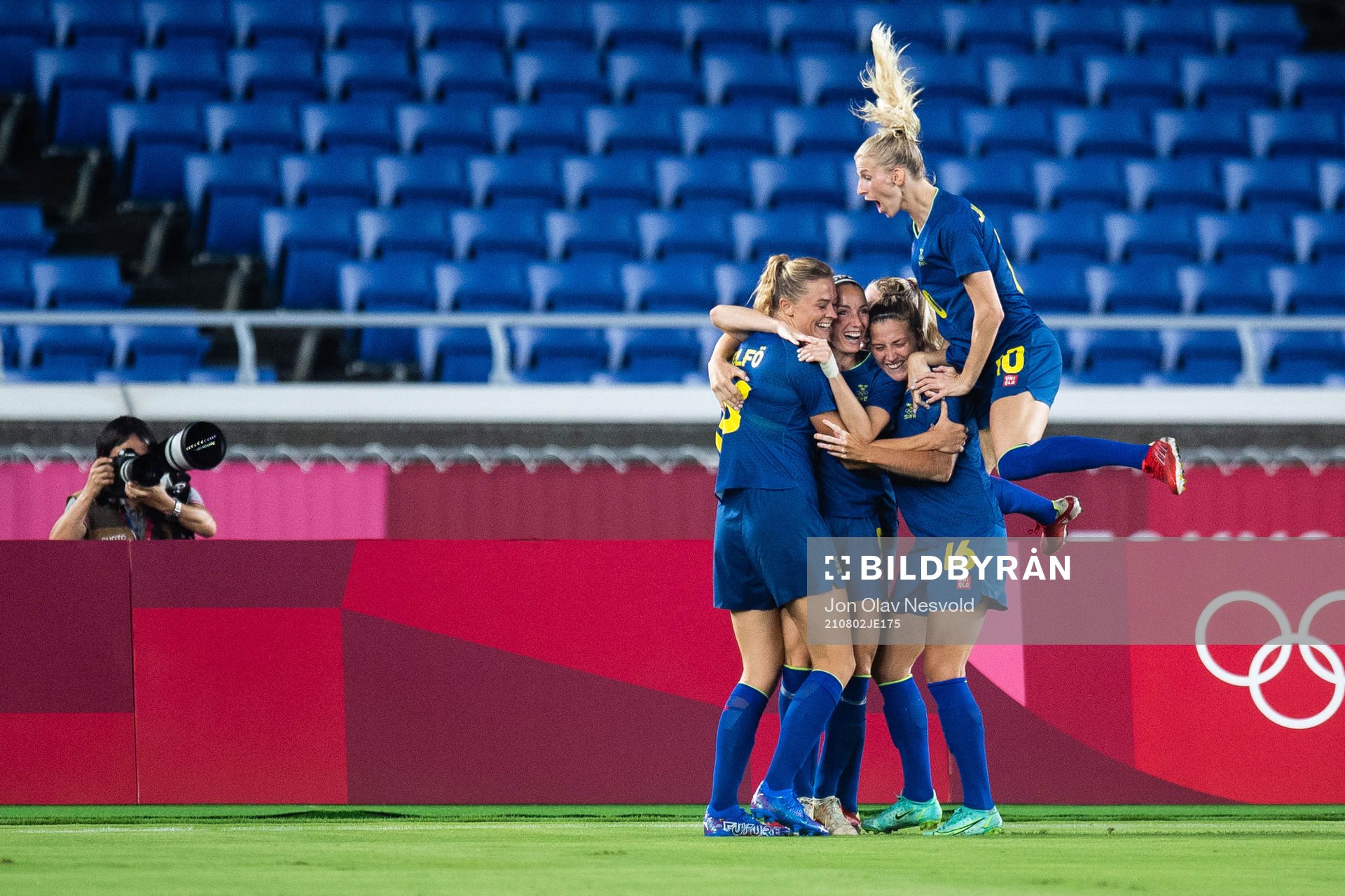 Fridolina Rolfö of Sweden celebrates with teammates 0-1
