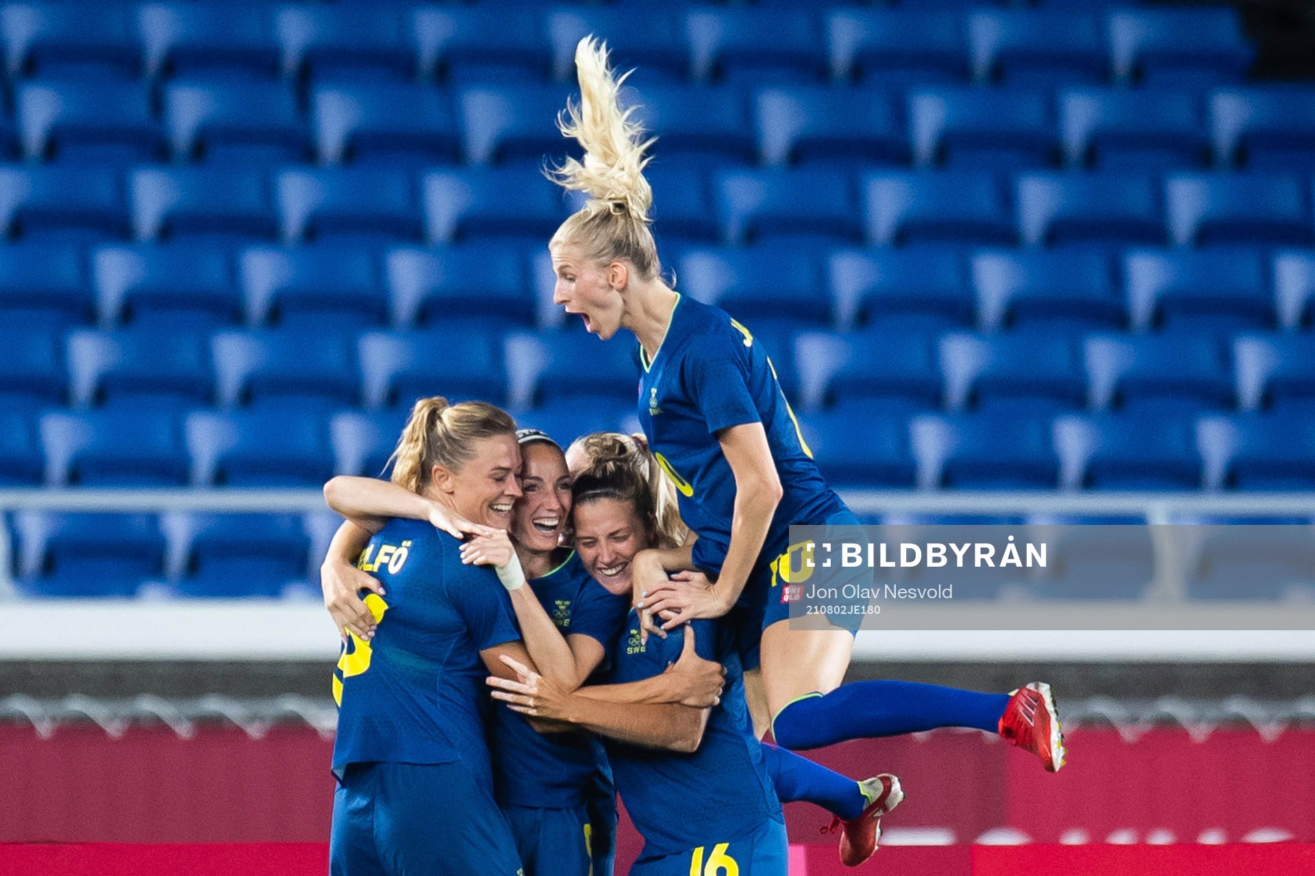 Fridolina Rolfö of Sweden celebrates with teammates 0-1