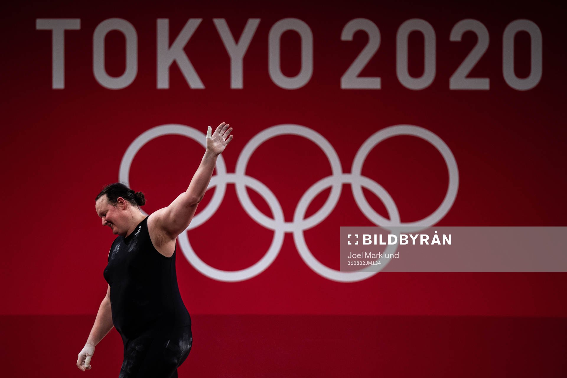 Laurel Hubbard of New Zealand competes in Women’s +87kg Group A weightlifting during day 10 of the Tokyo 2020 Olympic Games on August 2, 2021 in Tokyo. Hubbard wrote history together with Canadian football player Quinn by becoming the first openly transgender female athletes to compete at the Olympics.