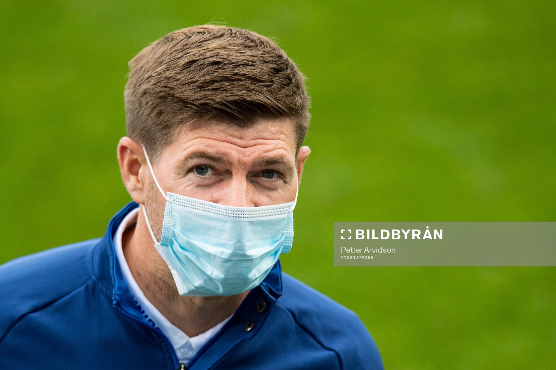 Steven Gerrard, head coach of Rangers inspect the pitch