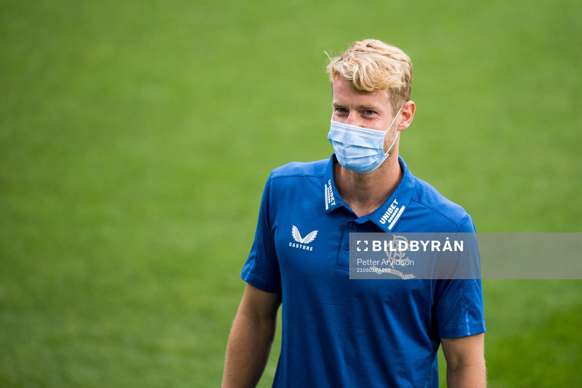 Filip Helander of Rangers inspect the pitch