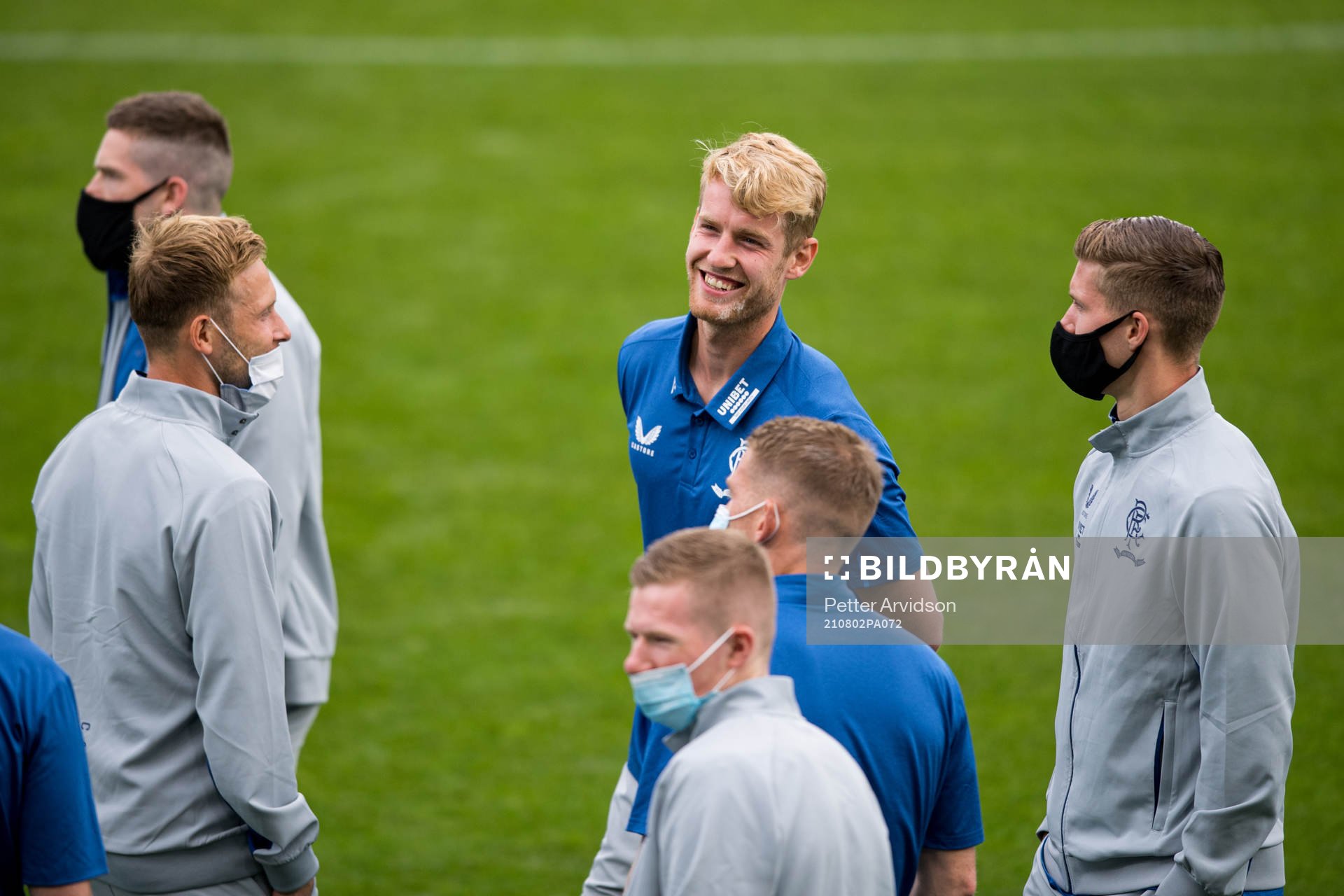 Filip Helander of Rangers inspect the pitch