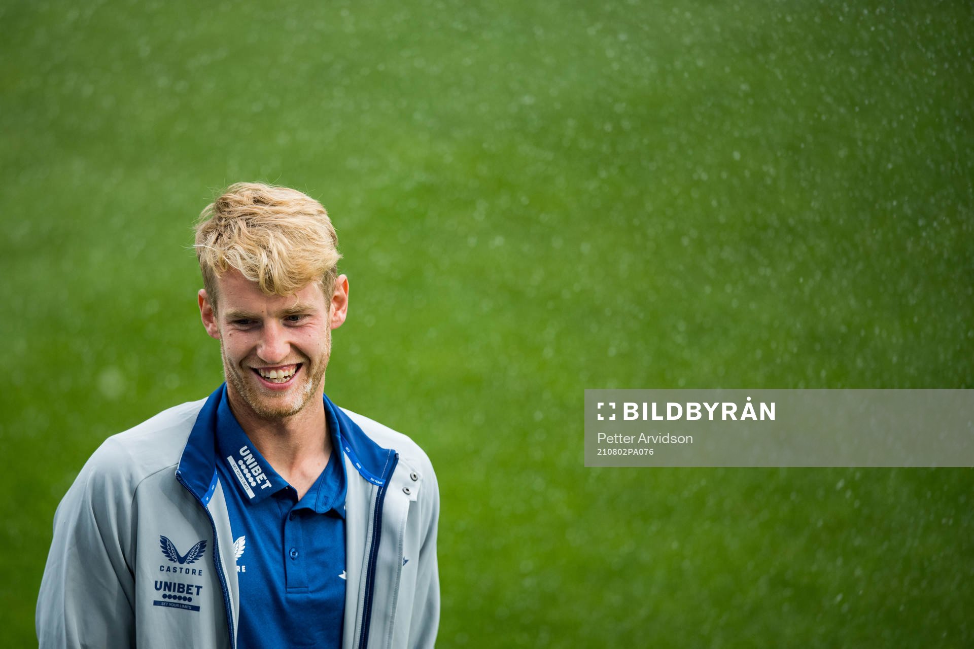 Filip Helander of Rangers inspect the pitch