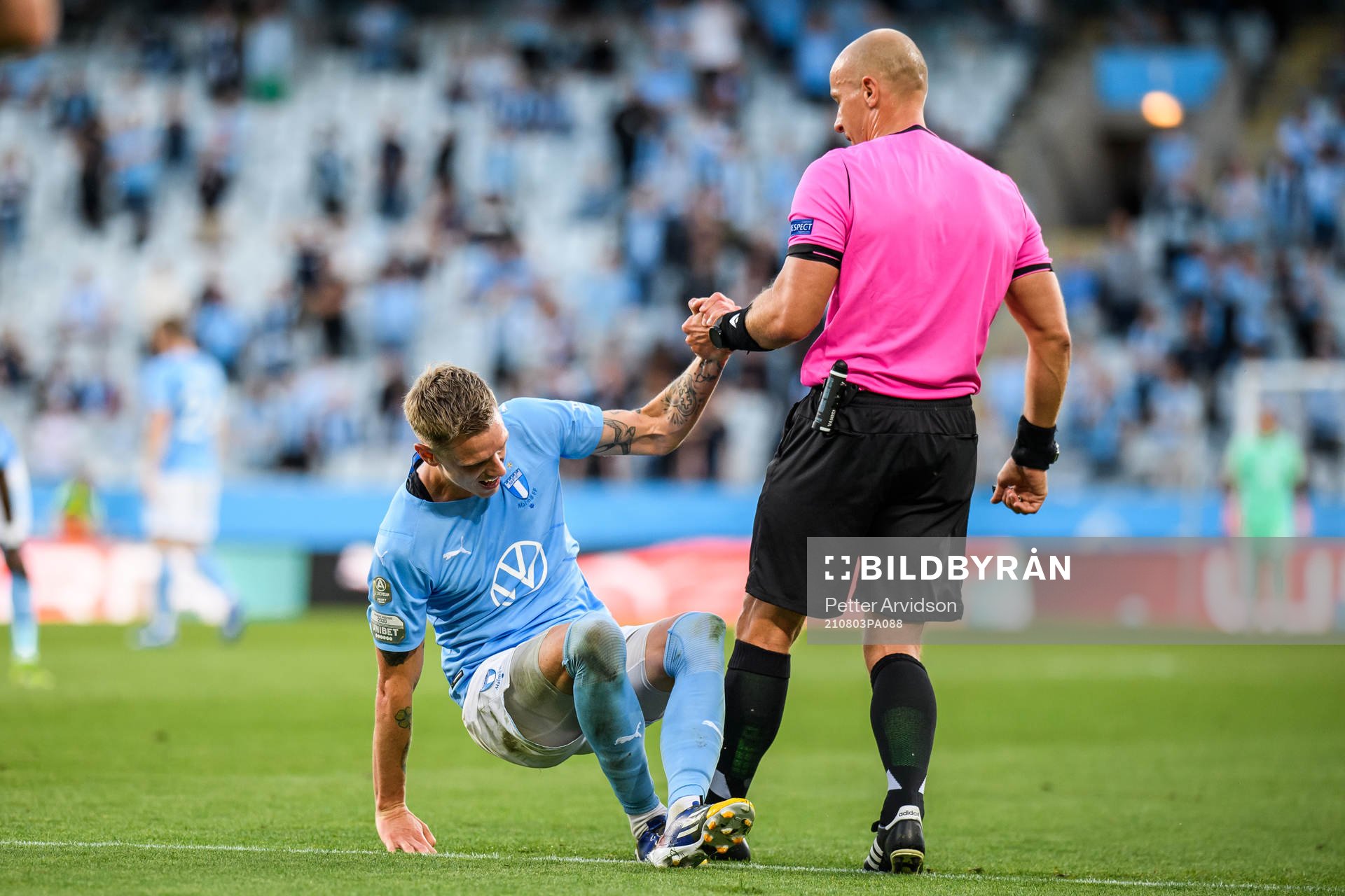 Sören Rieks of Malmö FF and Referee Szymon Marciniak