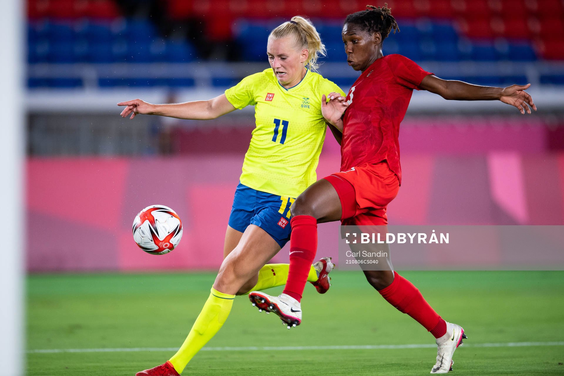 Stina Blackstenius of Sweden and Kadeisha Buchanan of