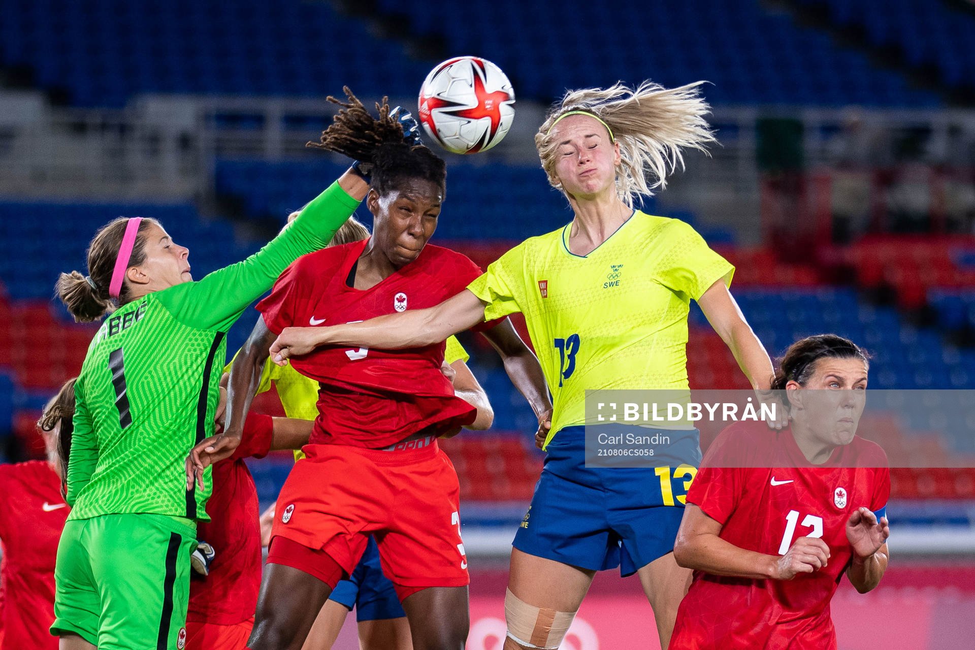 Goalkeeper Stephanie Labbe of Canada and Amanda Ilestedt of
