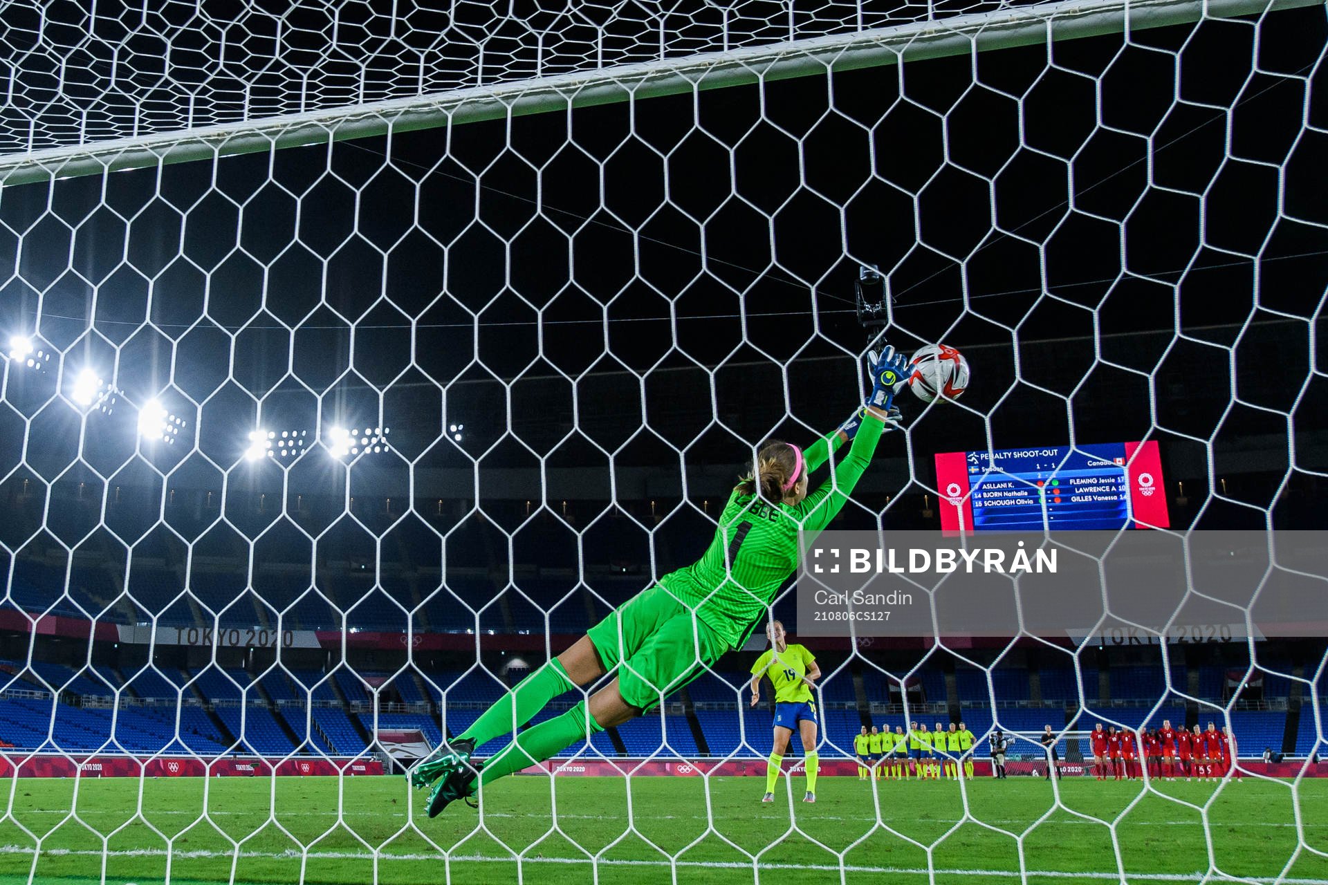 goalkeeper Stephanie Labbe of Canada saves a penalty from