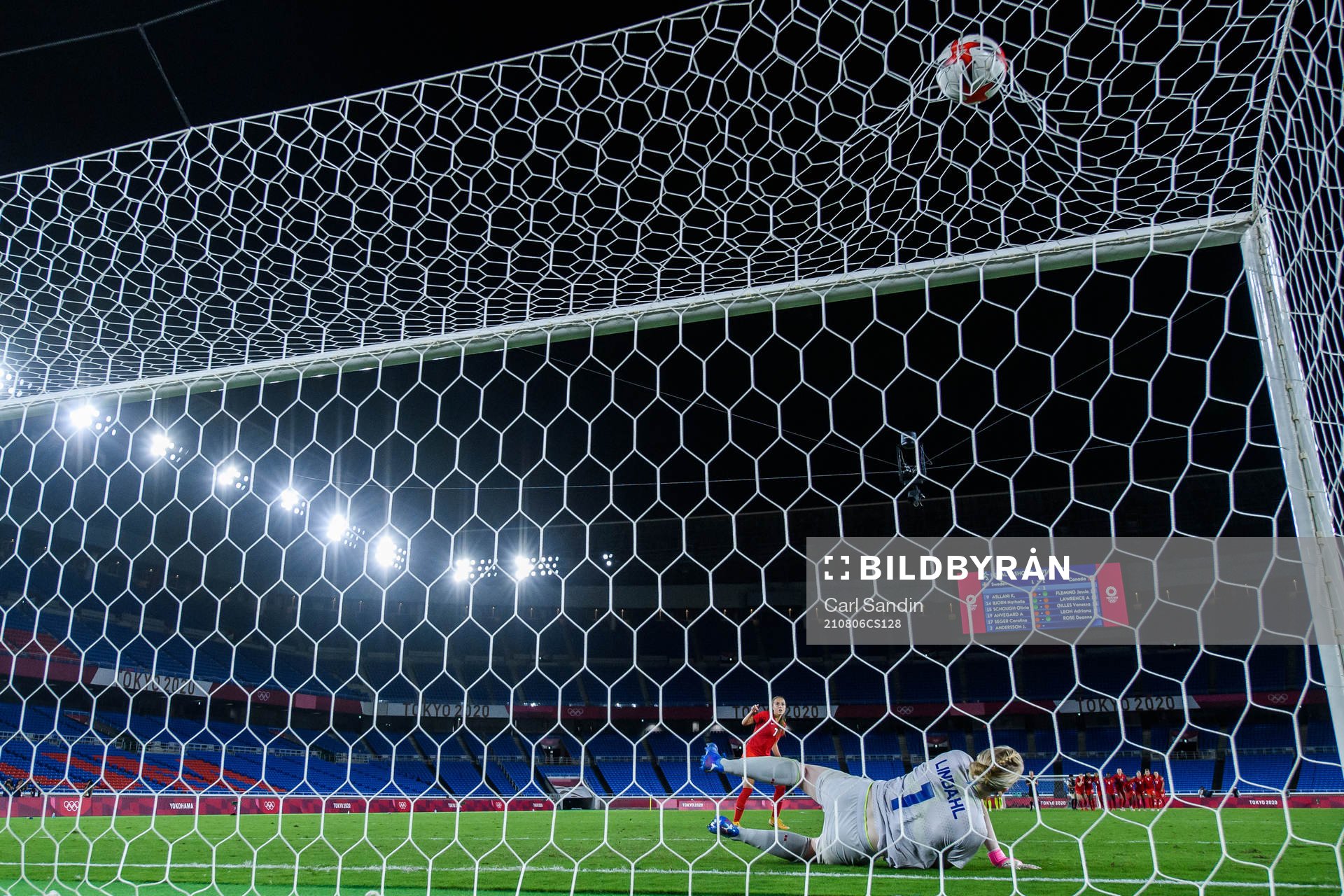 Julia Grosso of Canada scores the decisive penalty