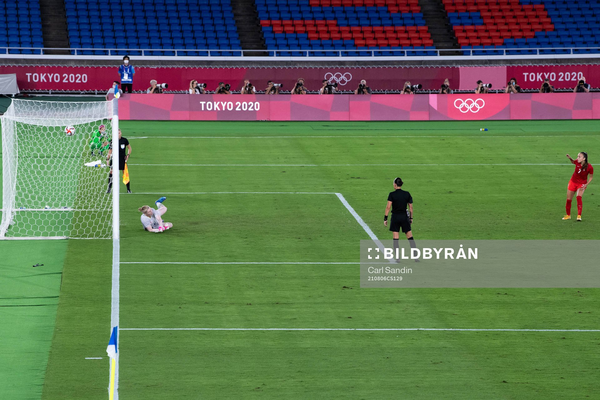 Julia Grosso of Canada scores her penalty behind goalkeeper