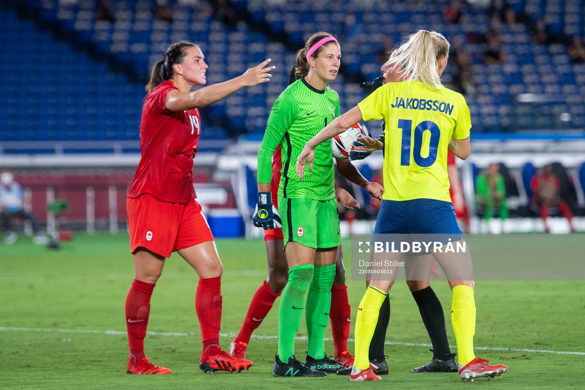 Goalkeeper Stephanie Labbe of Canada and Sofia Jakobsson of