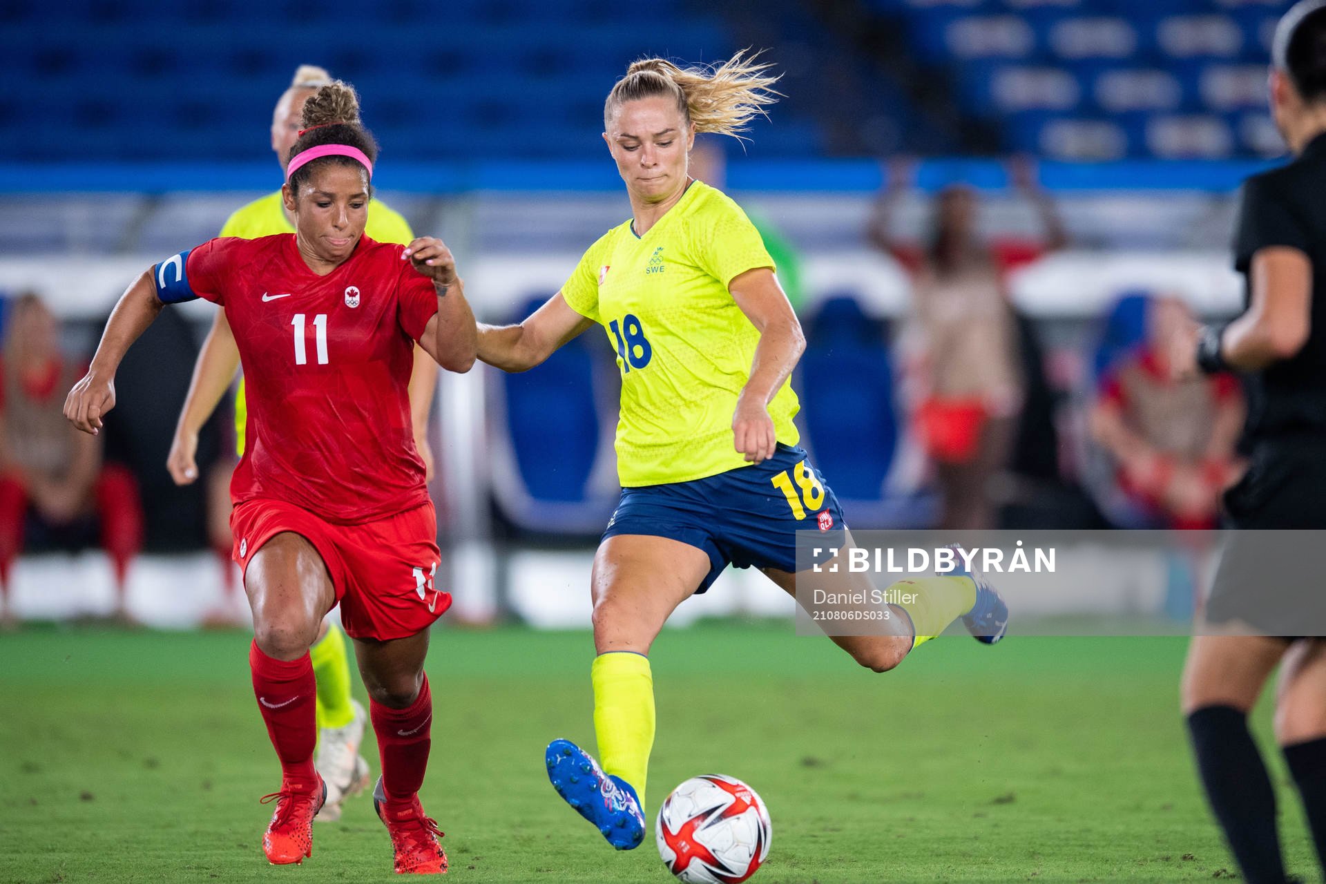 Desiree Scott of Canada and Fridolina Rolfö of Sweden  in