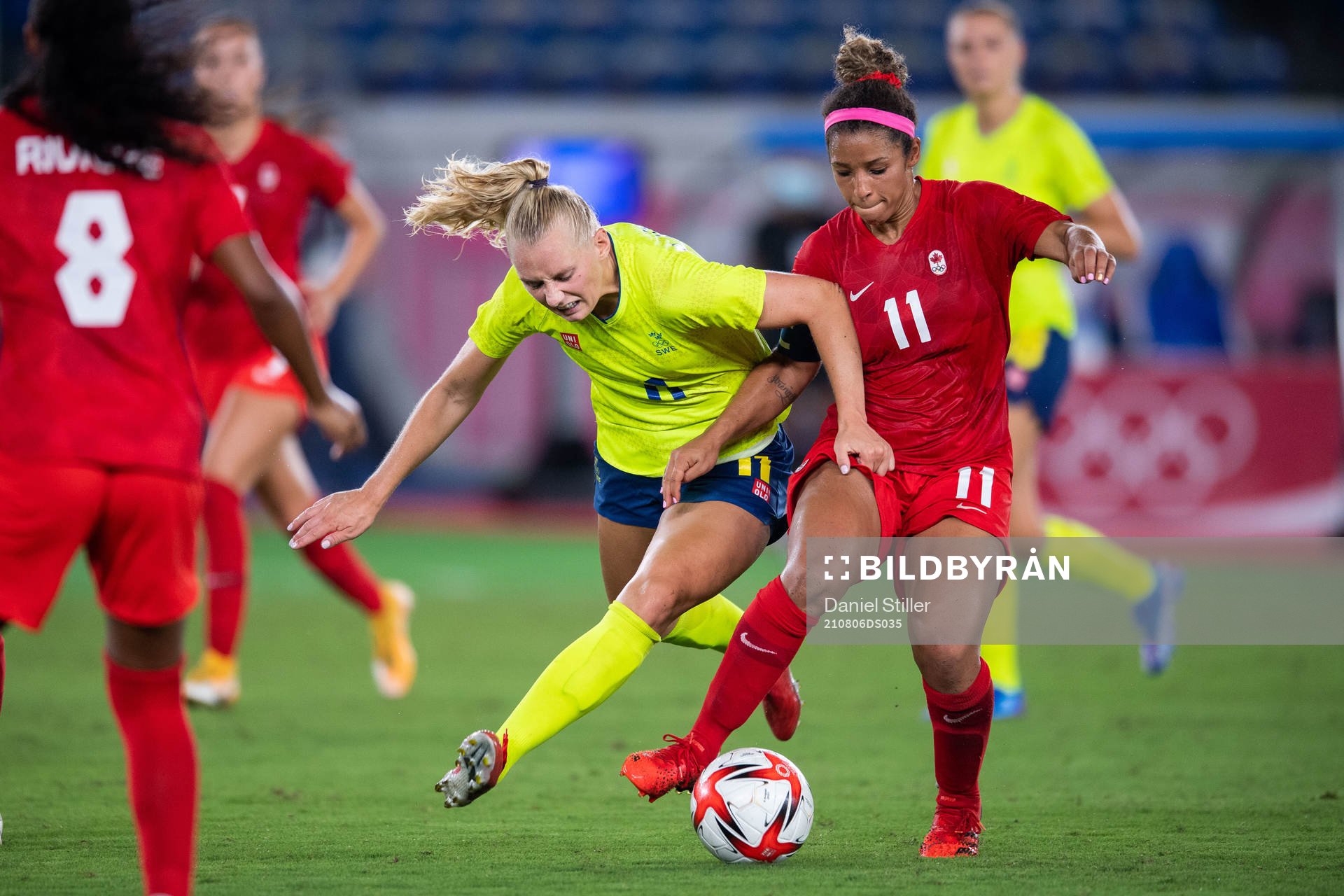 Stina Blackstenius of Sweden and Desiree Scott of Canada in
