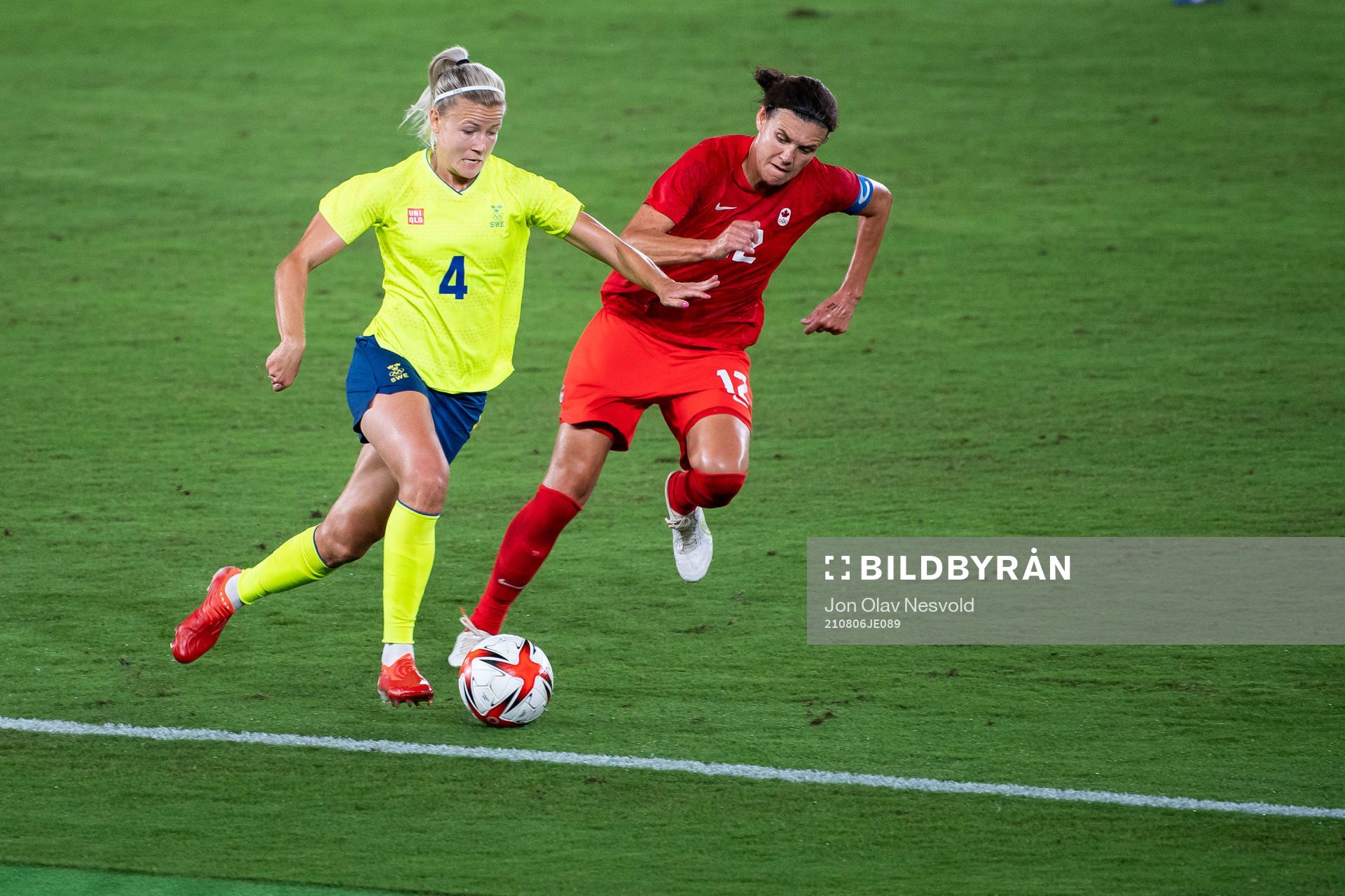 Hanna Glas of Sweden and Christine Sinclair of Canada in