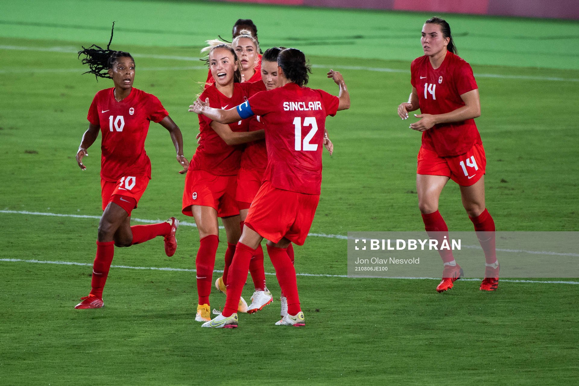 Players of Canada celebrates 1-1  in the women’s football