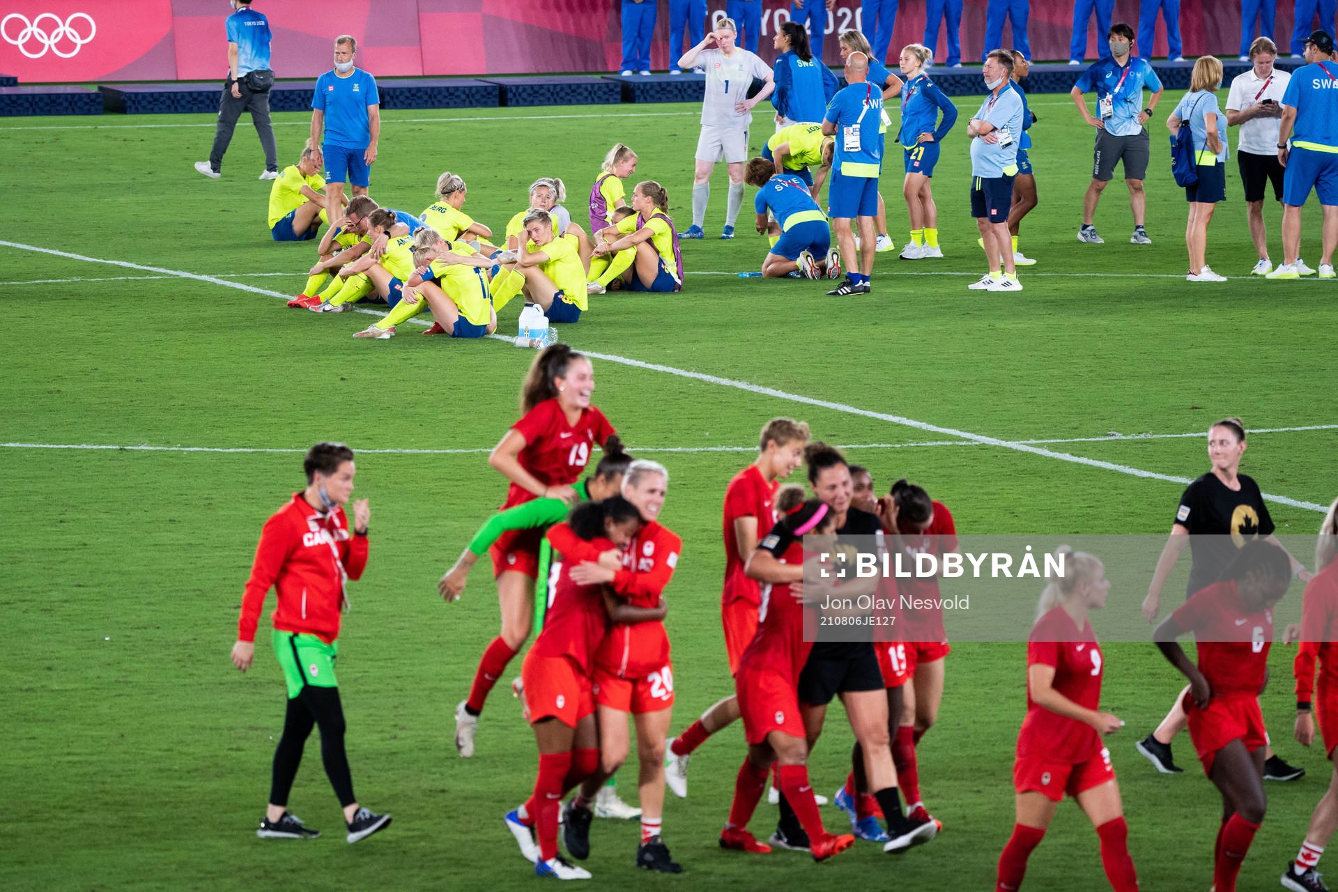 Players of Sweden looks dejected and players of Canada