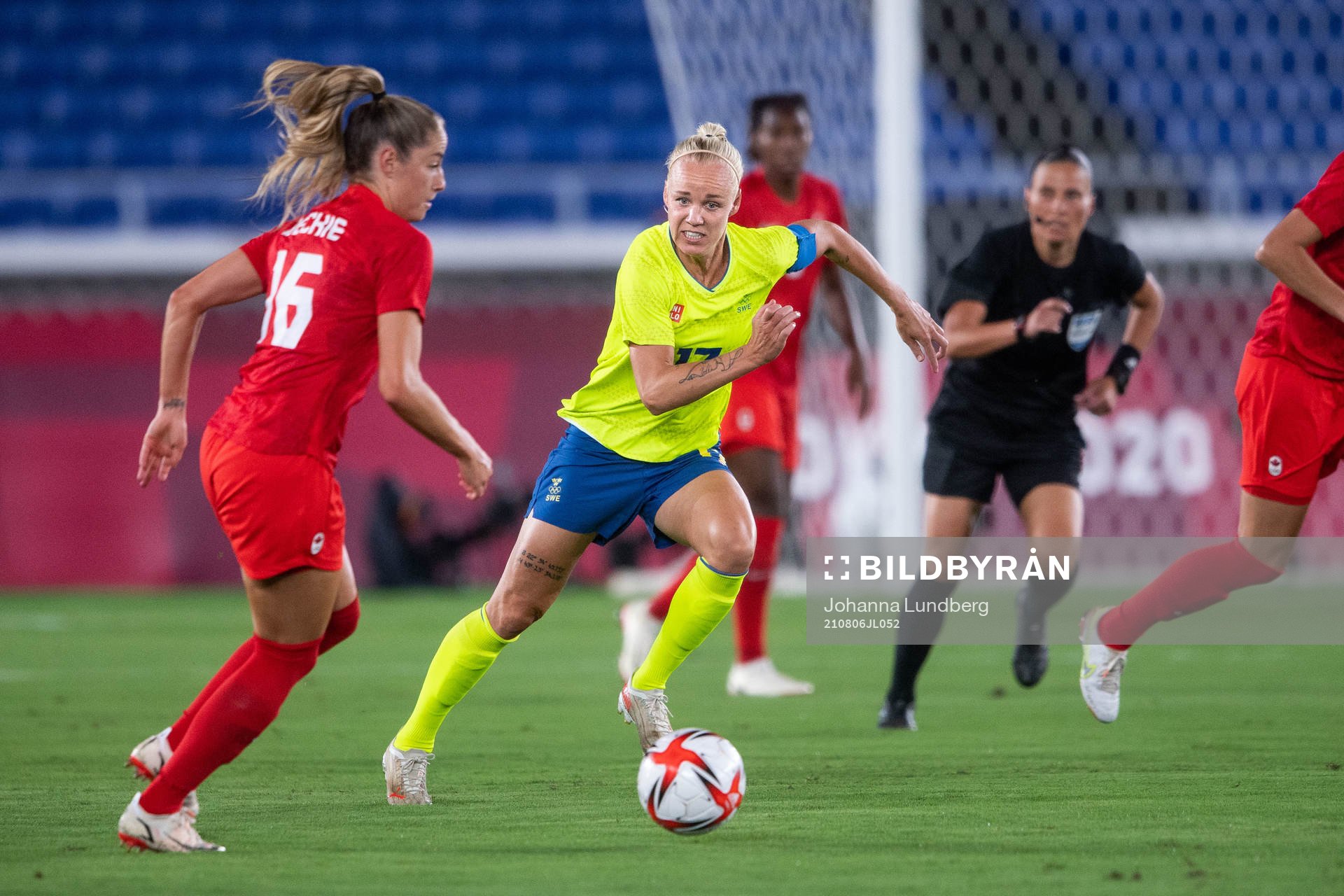 Caroline Seger of Sweden and Janine Beckie of Canada in the