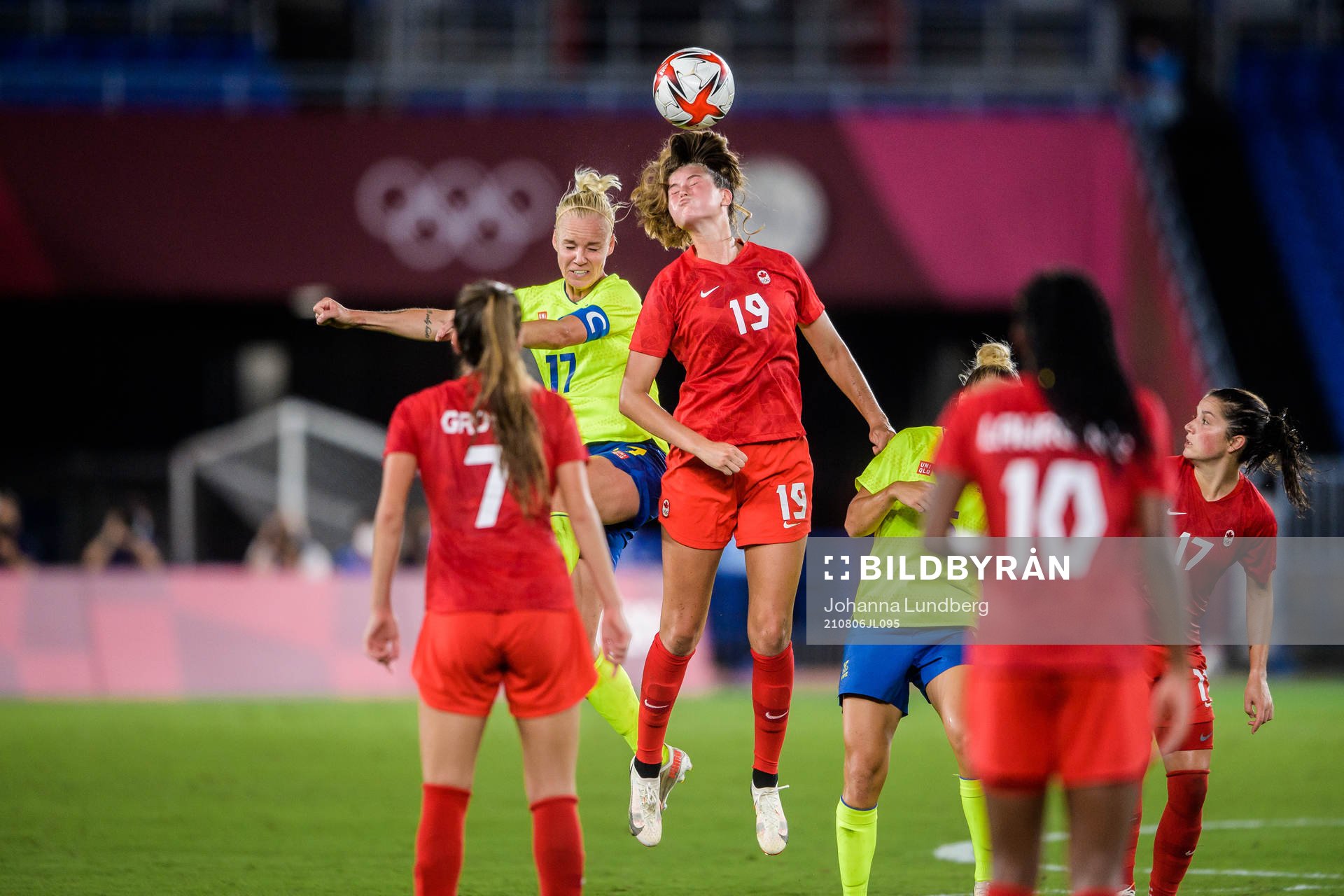Caroline Seger of Sweden and Jordyn Huitema of Canada in