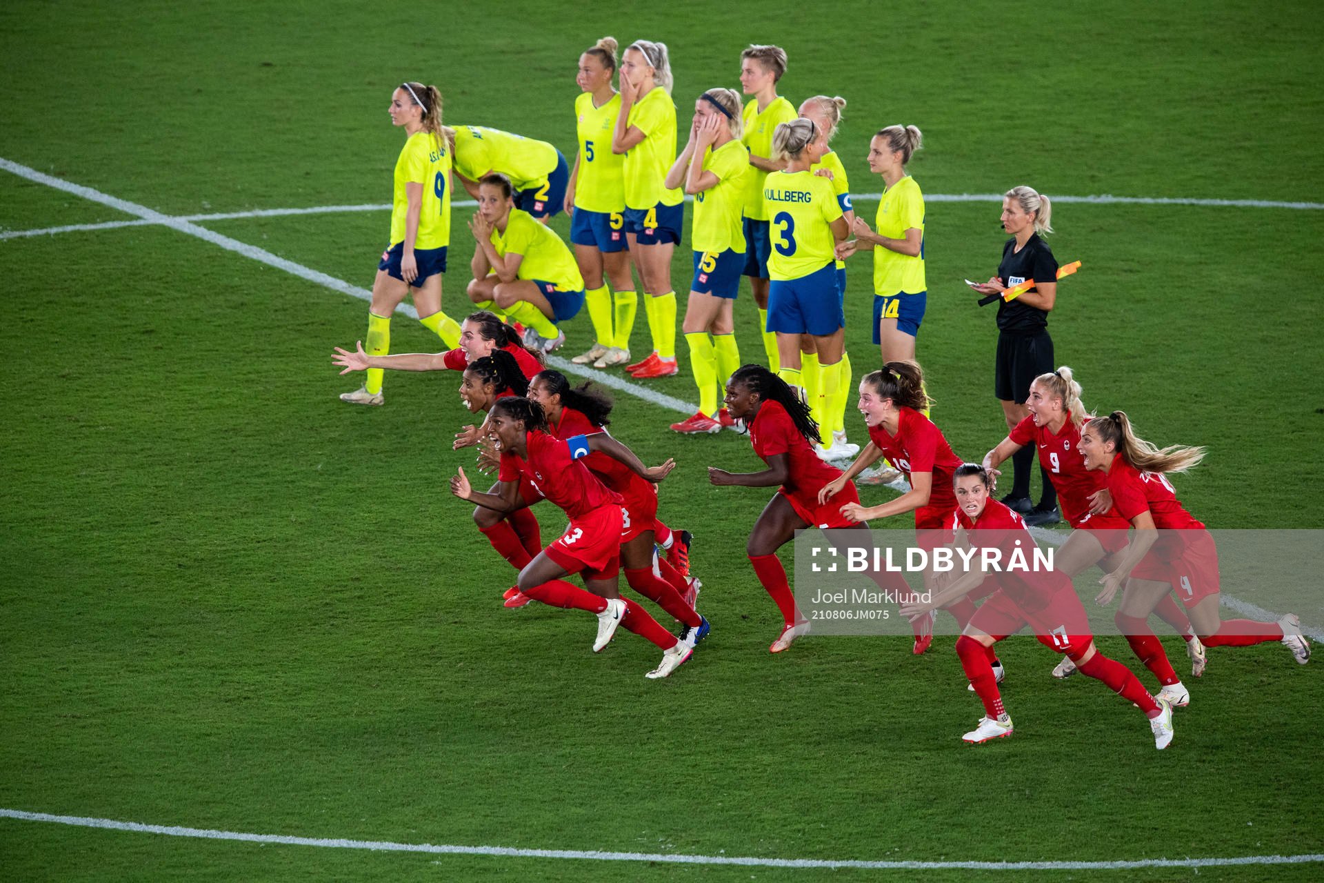 Players of Canada celebrates winning and players of Sweden