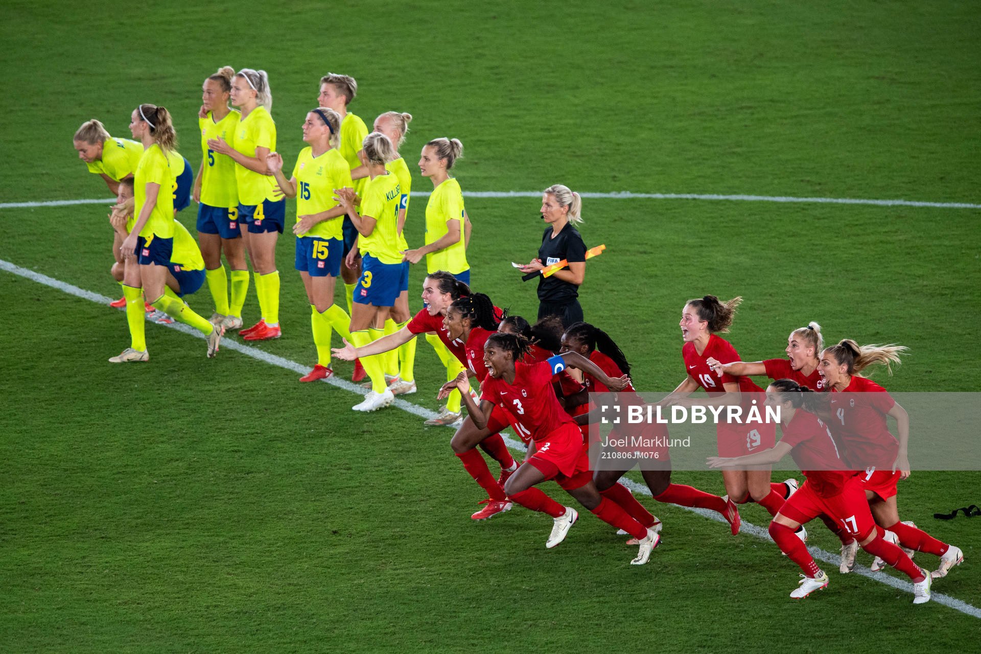 Players of Canada celebrates winning and players of Sweden