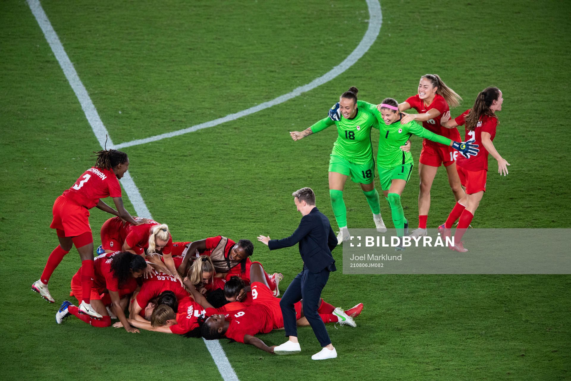 Players of Canada celebrates winning and players of Sweden