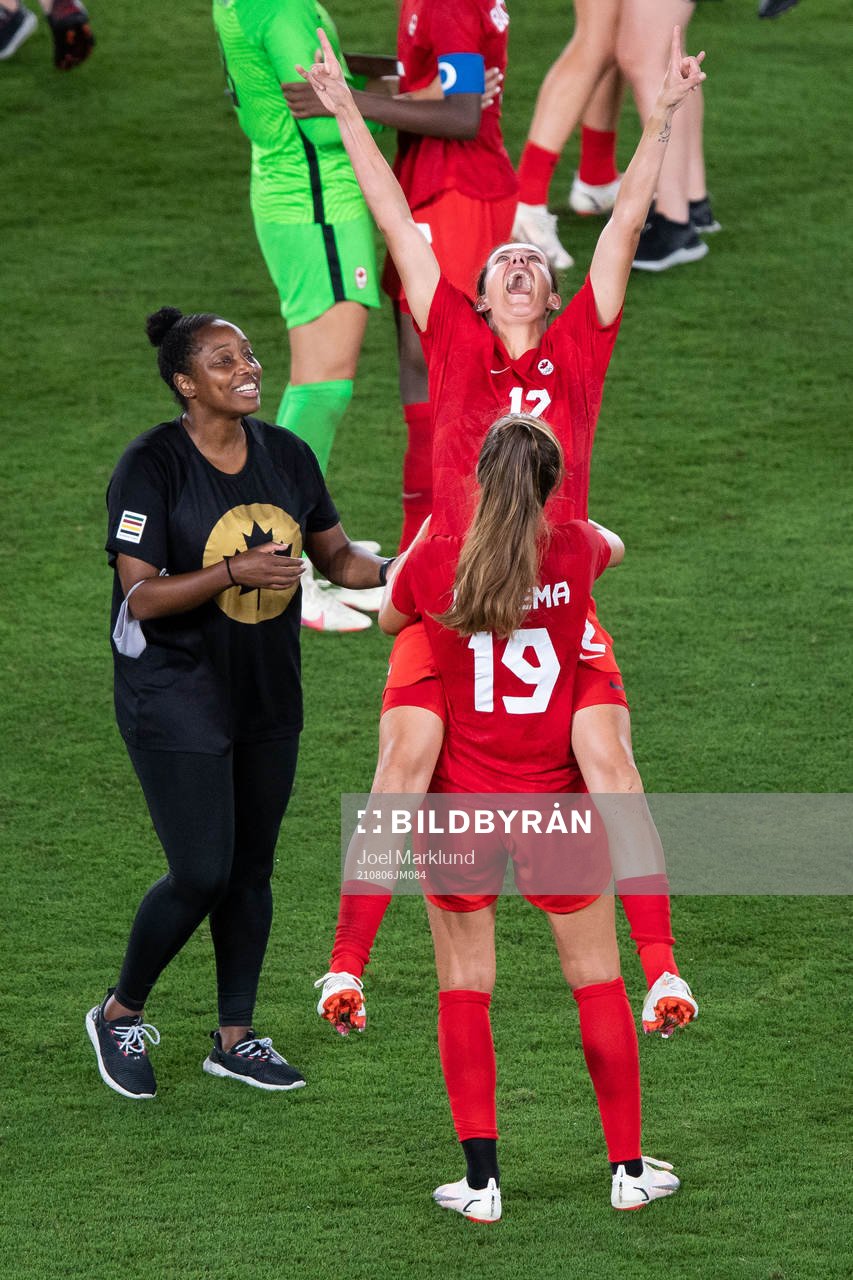 Christine Sinclair and Jordyn Huitema of Canada celebrates