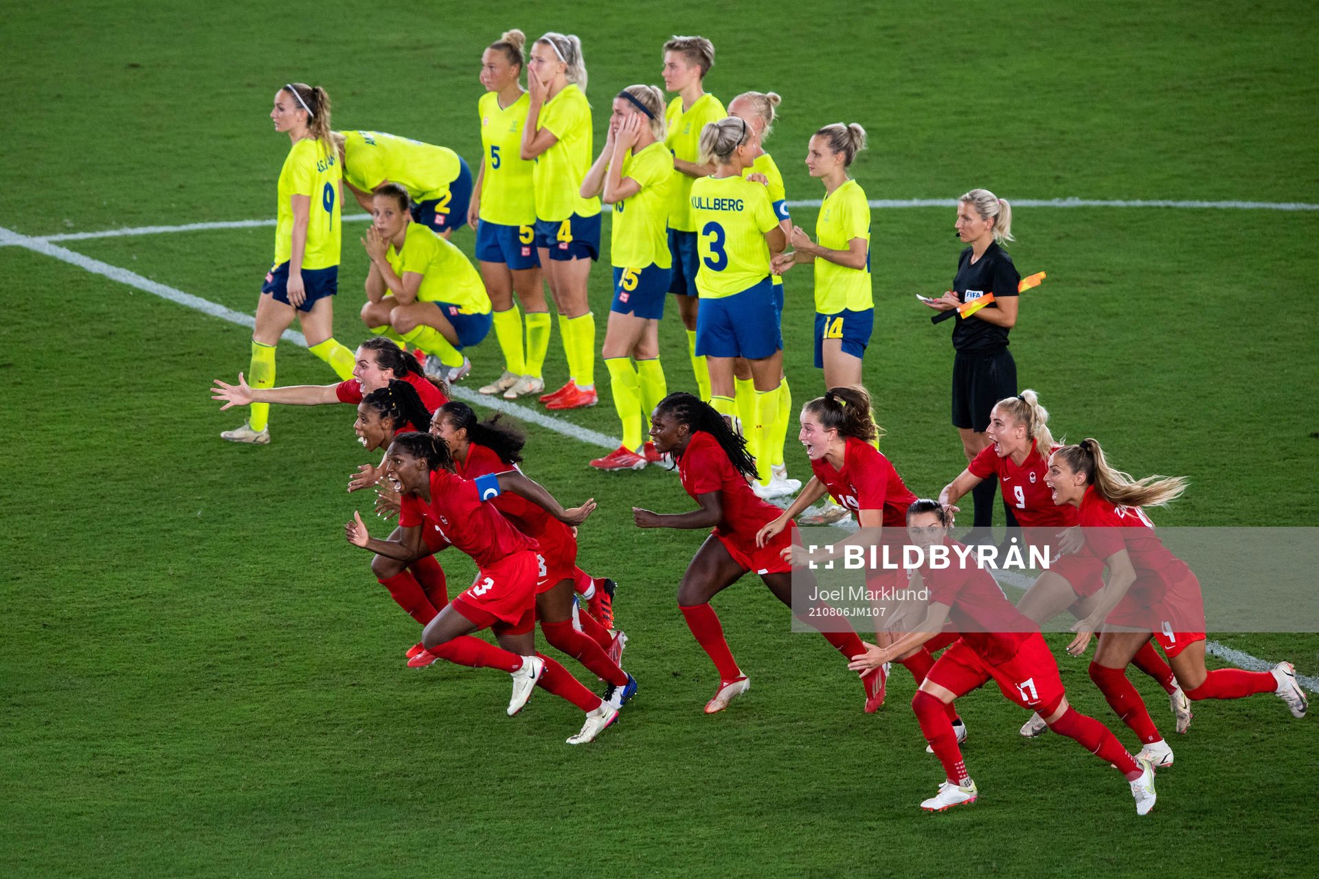 Players of Canada celebrates winning and players of Sweden