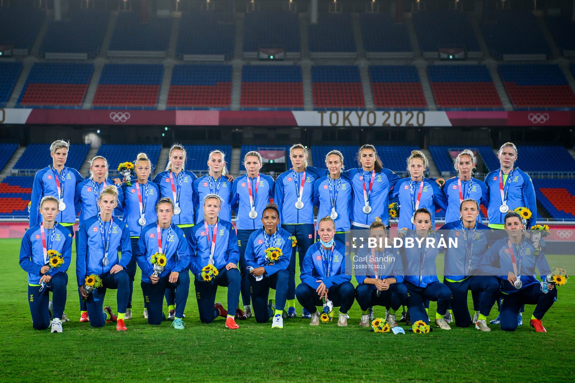 Players of Sweden pose for a photo