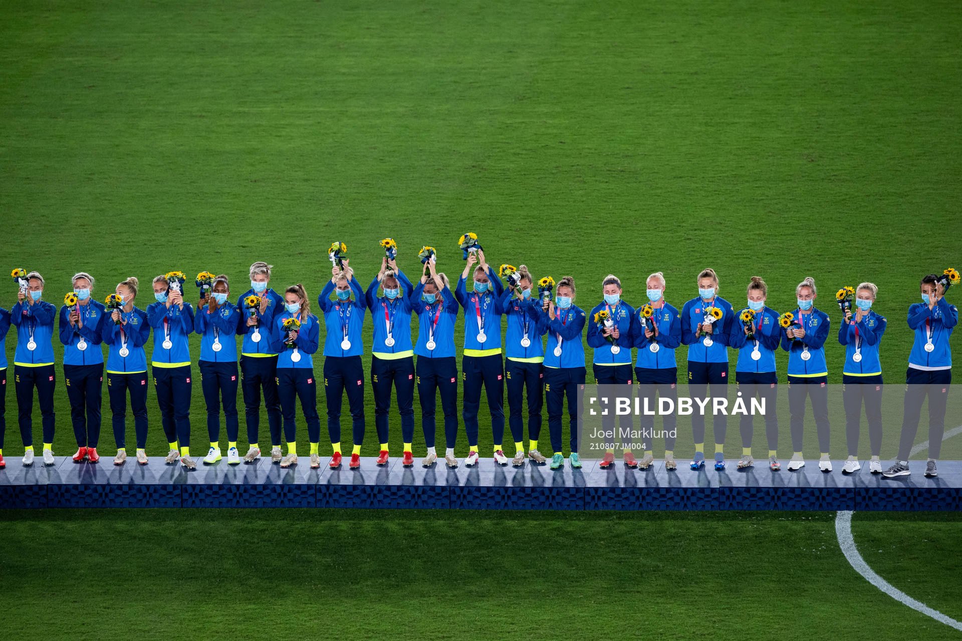 Players of Sweden at the podium at the medal ceremony