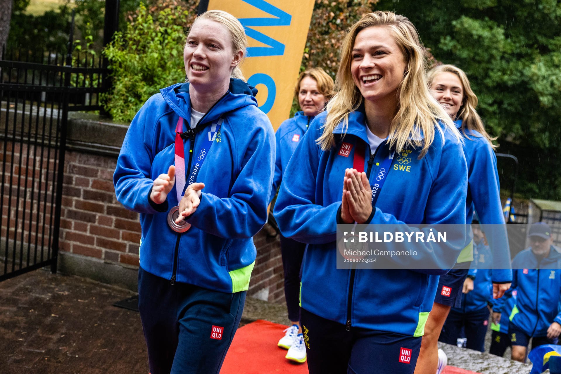 Hedvig Lindahl and Fridolina Rolfö of Sweden arrive at a