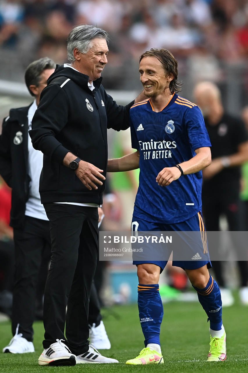 Carlo Ancelotti coach of Real Madrid and Luka Modric of