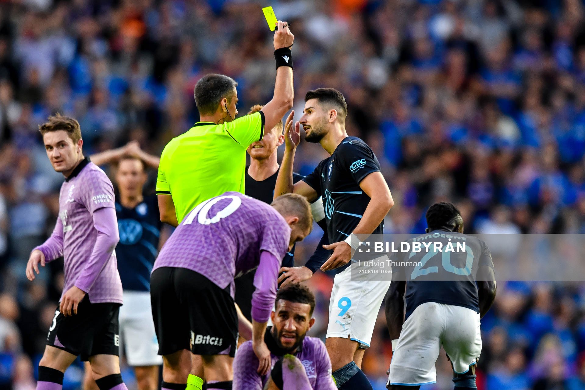 Bonke Innocent of Malmö FF receives his second yellow card