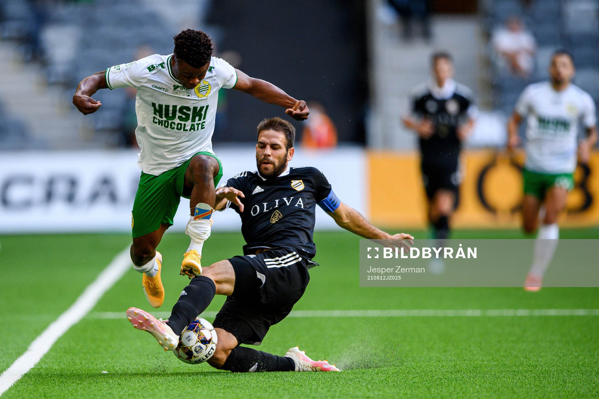 Akinkunmi Amoo of Hammarby and Marko Docic of Cukaricki