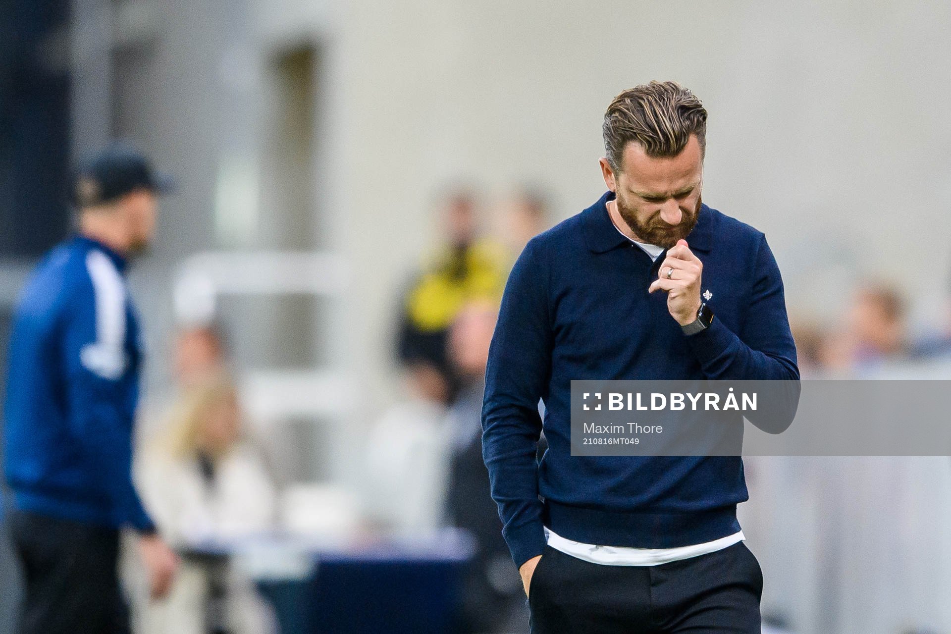s tränare Bartosz Grzelak deppar