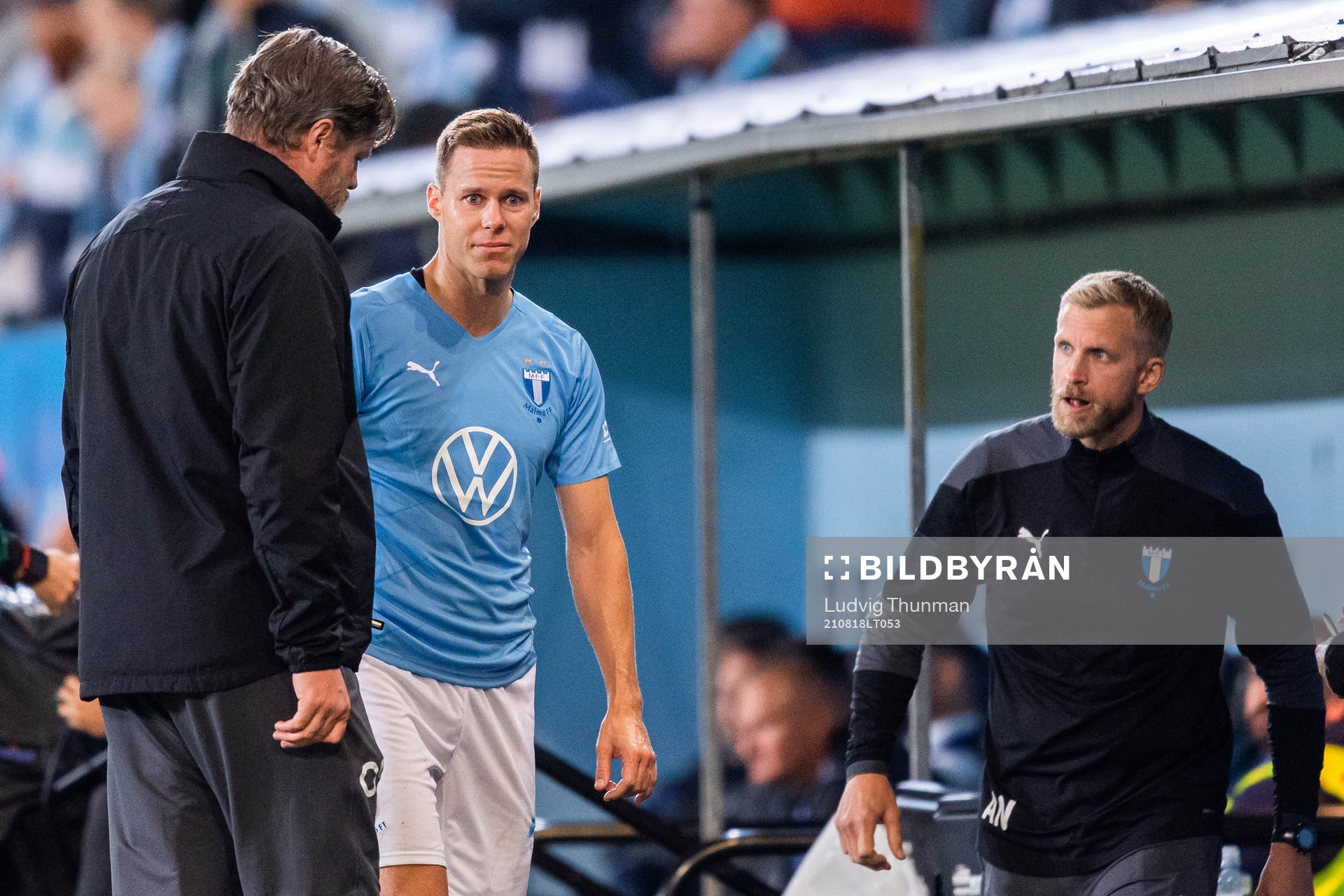 Niklas Moisander of Malmö FF leaves the pitch due to injury